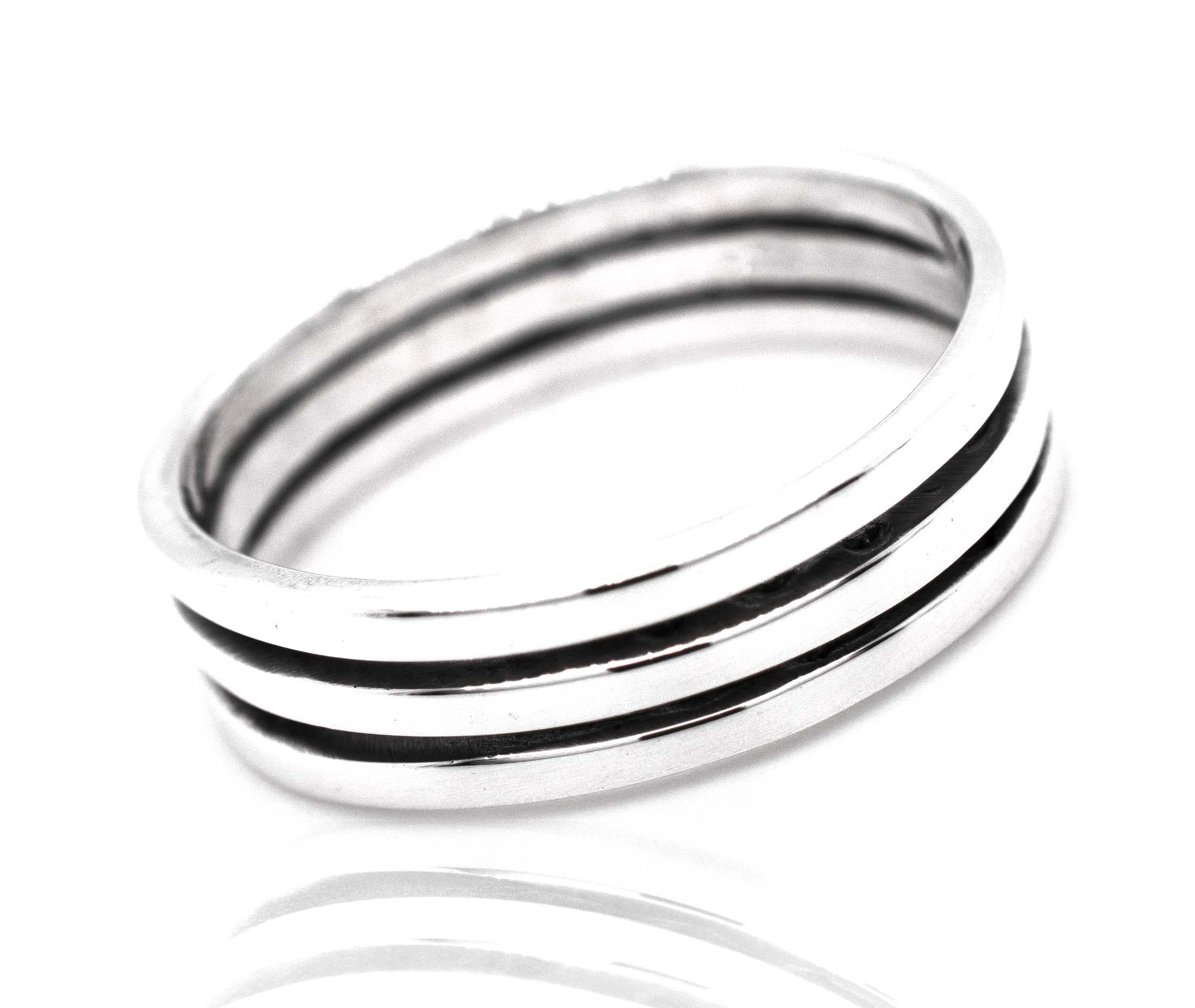A Triple Stripe Band by Super Silver, .925 silver ring with black and white stripes.