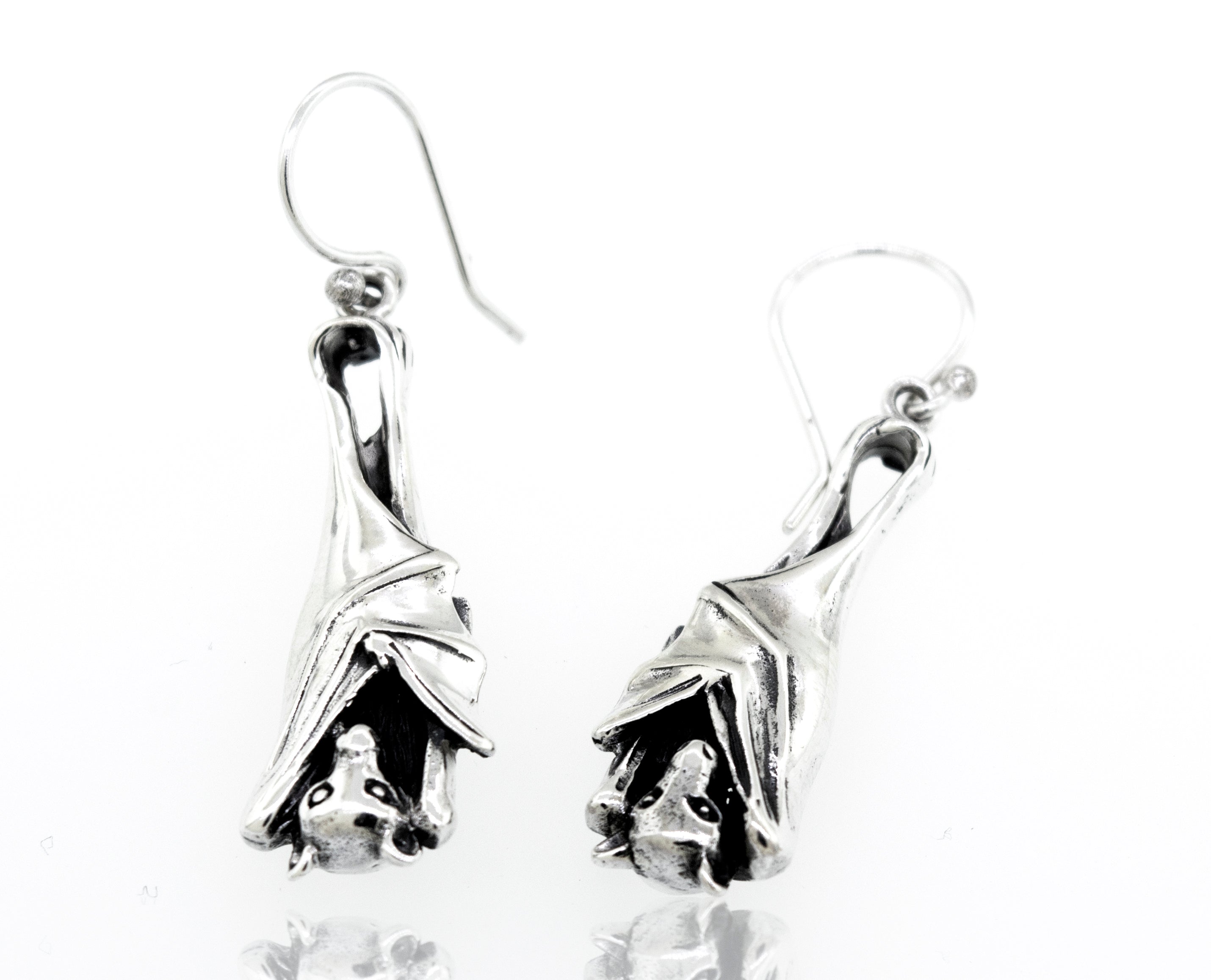 A pair of Super Silver Designer Bat Dangle Earrings featuring sleeping bats.