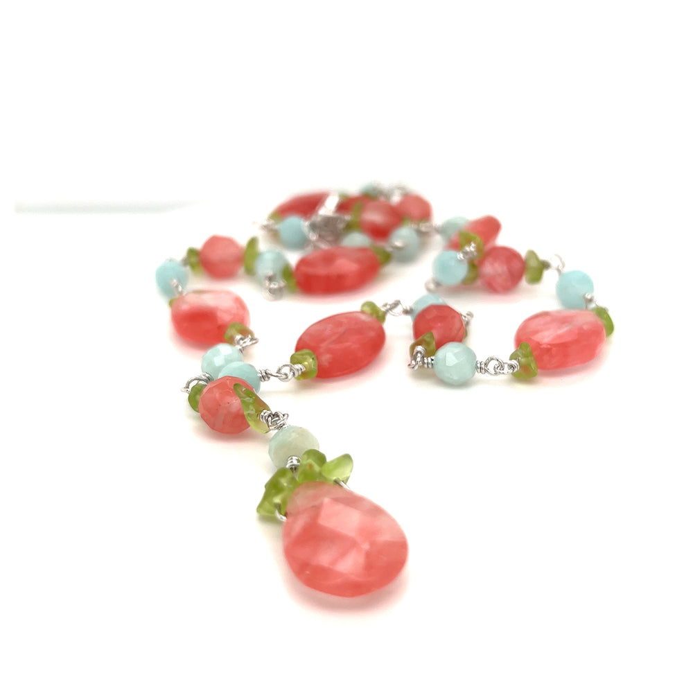 
                  
                    A Beaded Multicolor Y-necklace with coral and turquoise beads by Super Silver.
                  
                