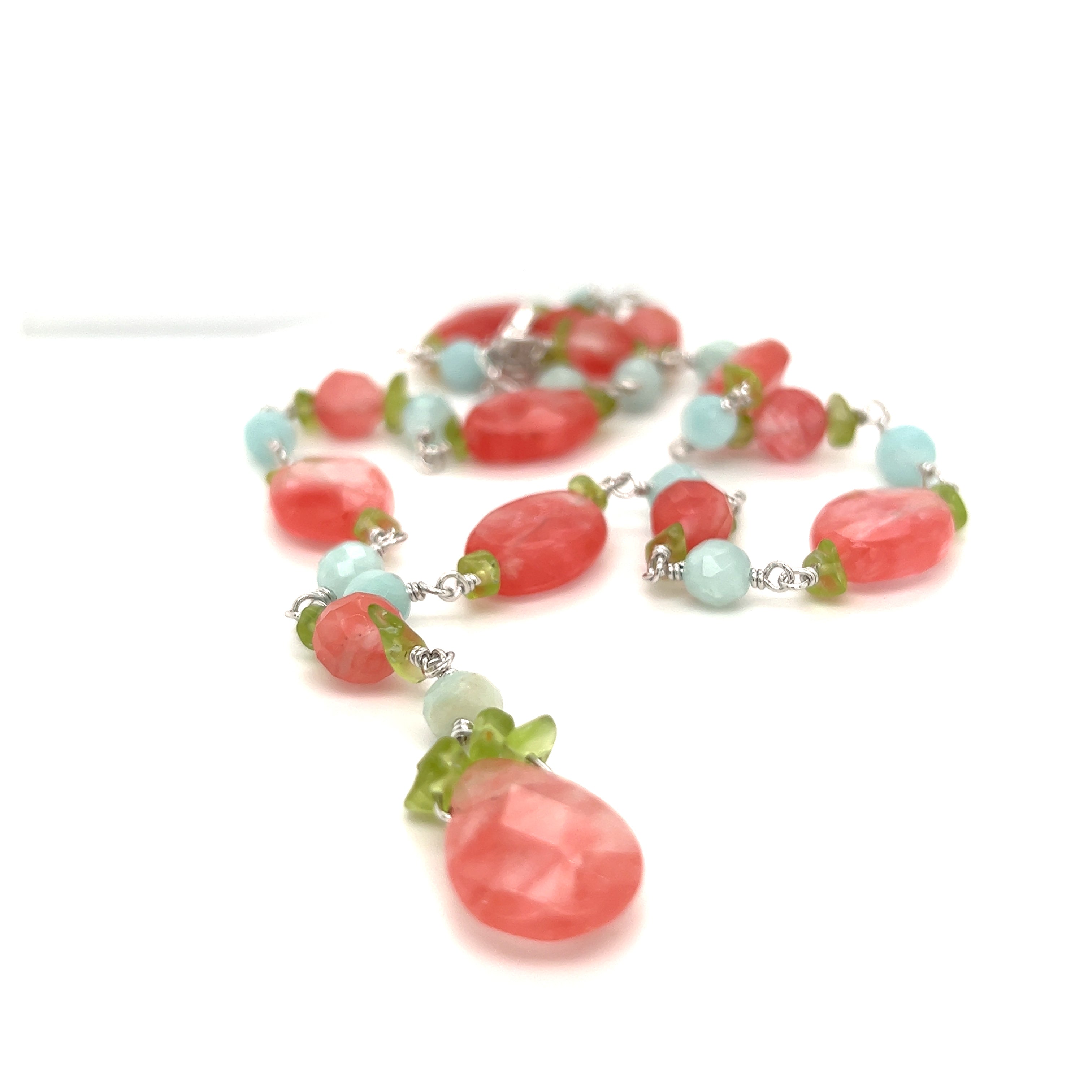A Beaded Multicolor Y-necklace with coral and turquoise beads by Super Silver.