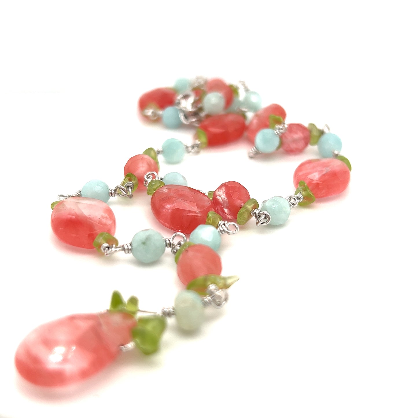 A Super Silver Beaded Multicolor Y-necklace with coral and turquoise beads.