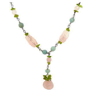 A Super Silver Beaded Multicolor Y-necklace with green leaves.