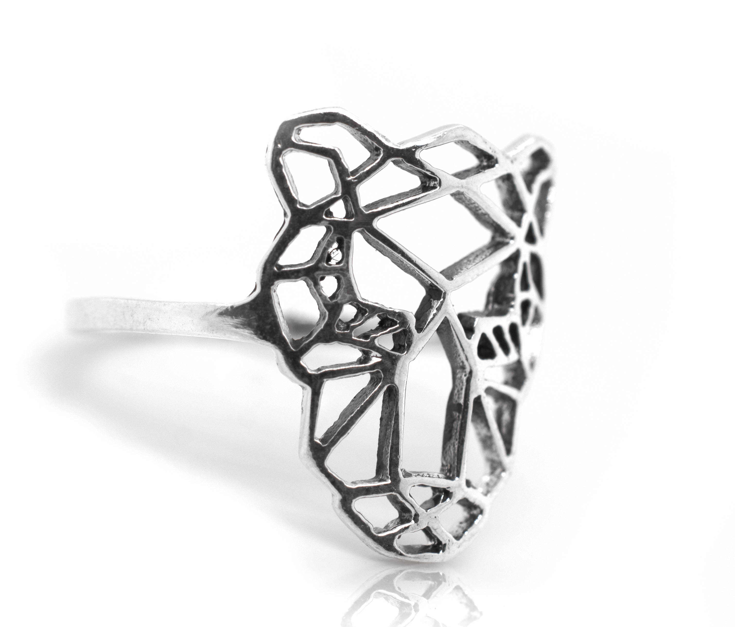A minimalist Cut Out Jaguar Ring with an animal head on it.