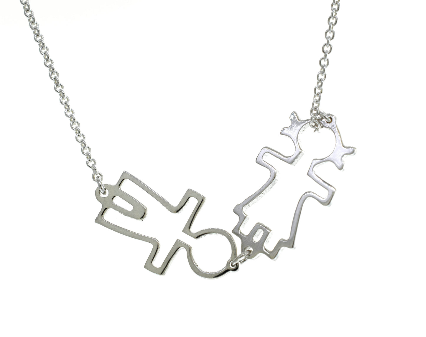 A Super Silver Little Humans Necklace with two figures symbolizing love.
