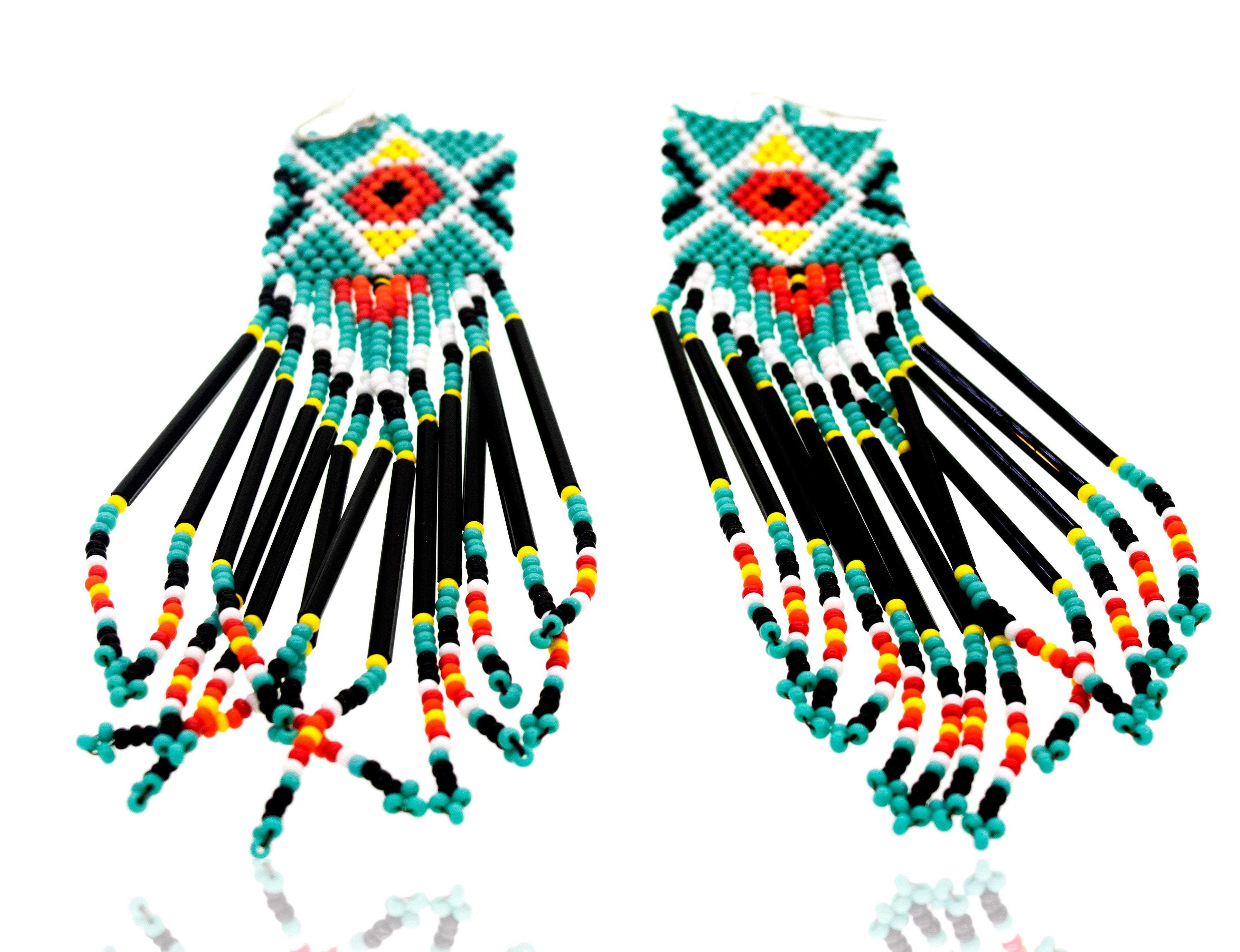 A pair of Super Silver Handmade Southwest inspired earrings adorned with colorful gemstone beads.