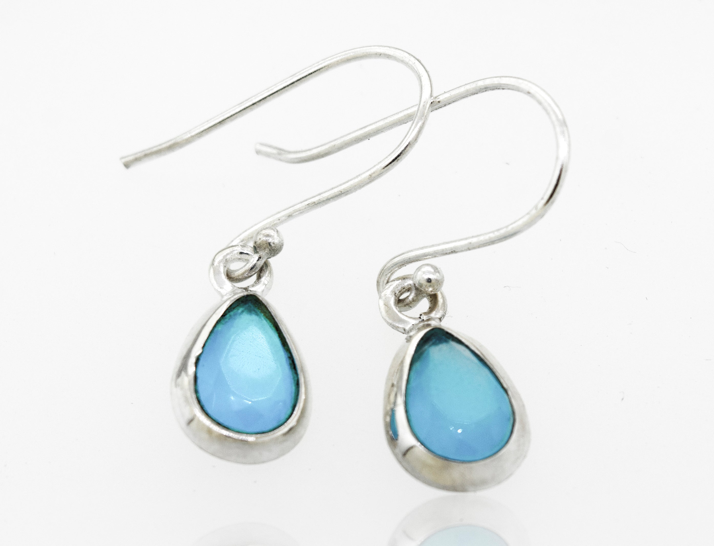 A pair of Simple Teardrop Shape Blue Chalcedony earrings with a Super Silver setting.