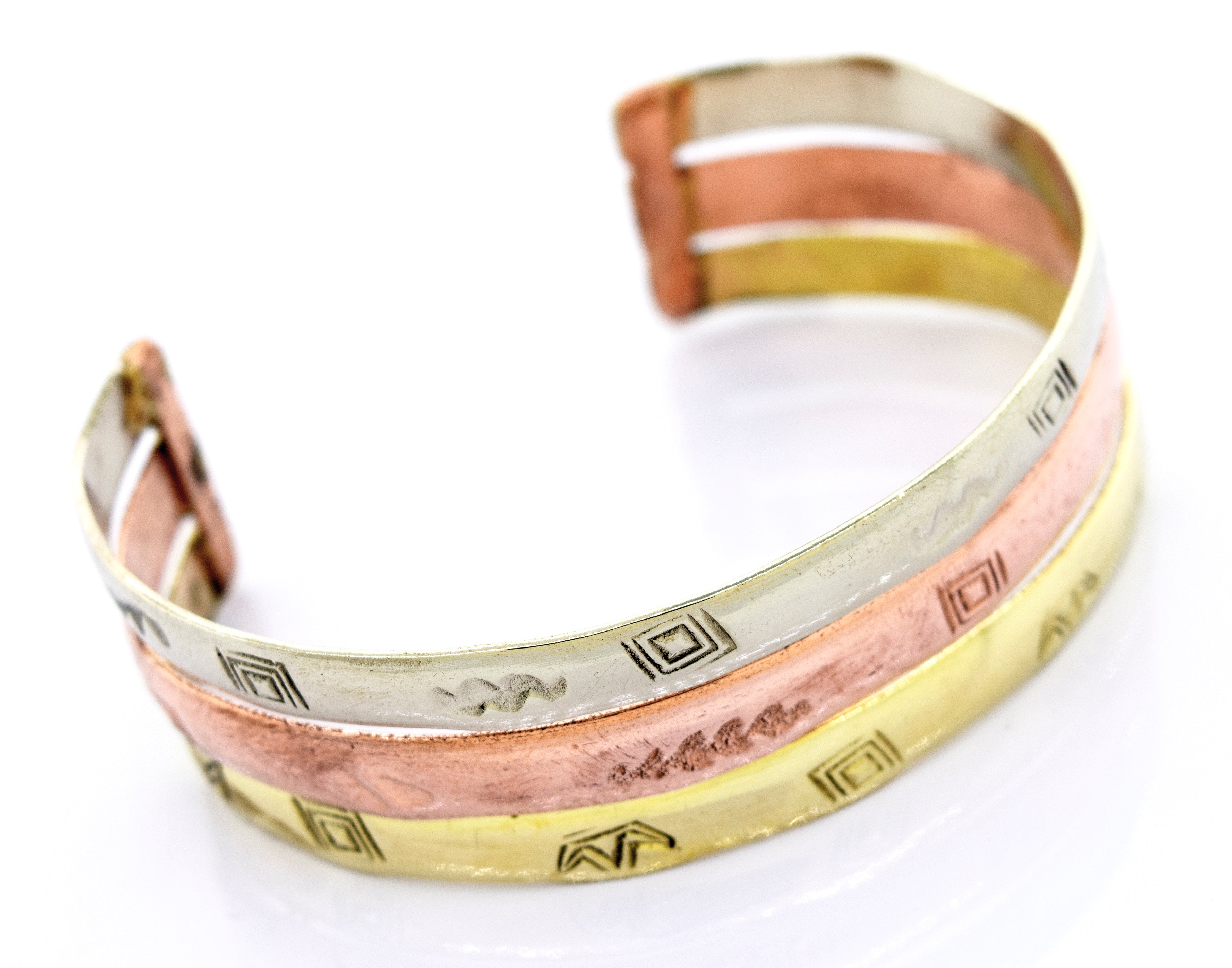 Three Super Silver Gold Plated Bracelets With Freestyle Engraving with different colors and designs featuring gold plating.