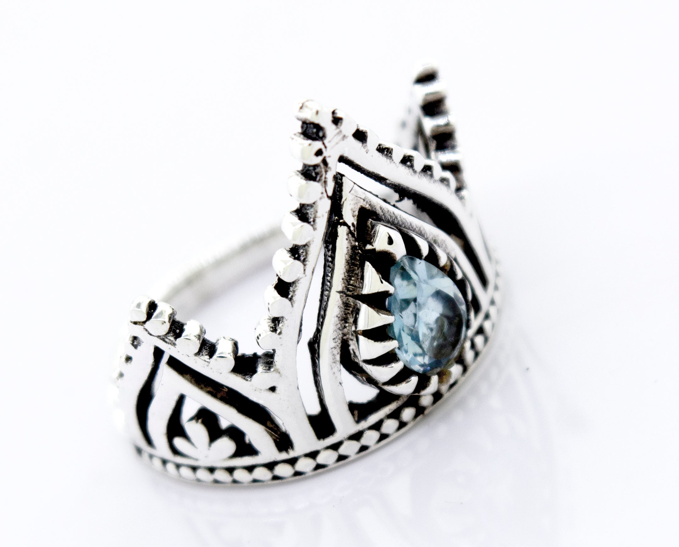 A Super Silver Crown Ring with Teardrop Shape Blue Topaz.
