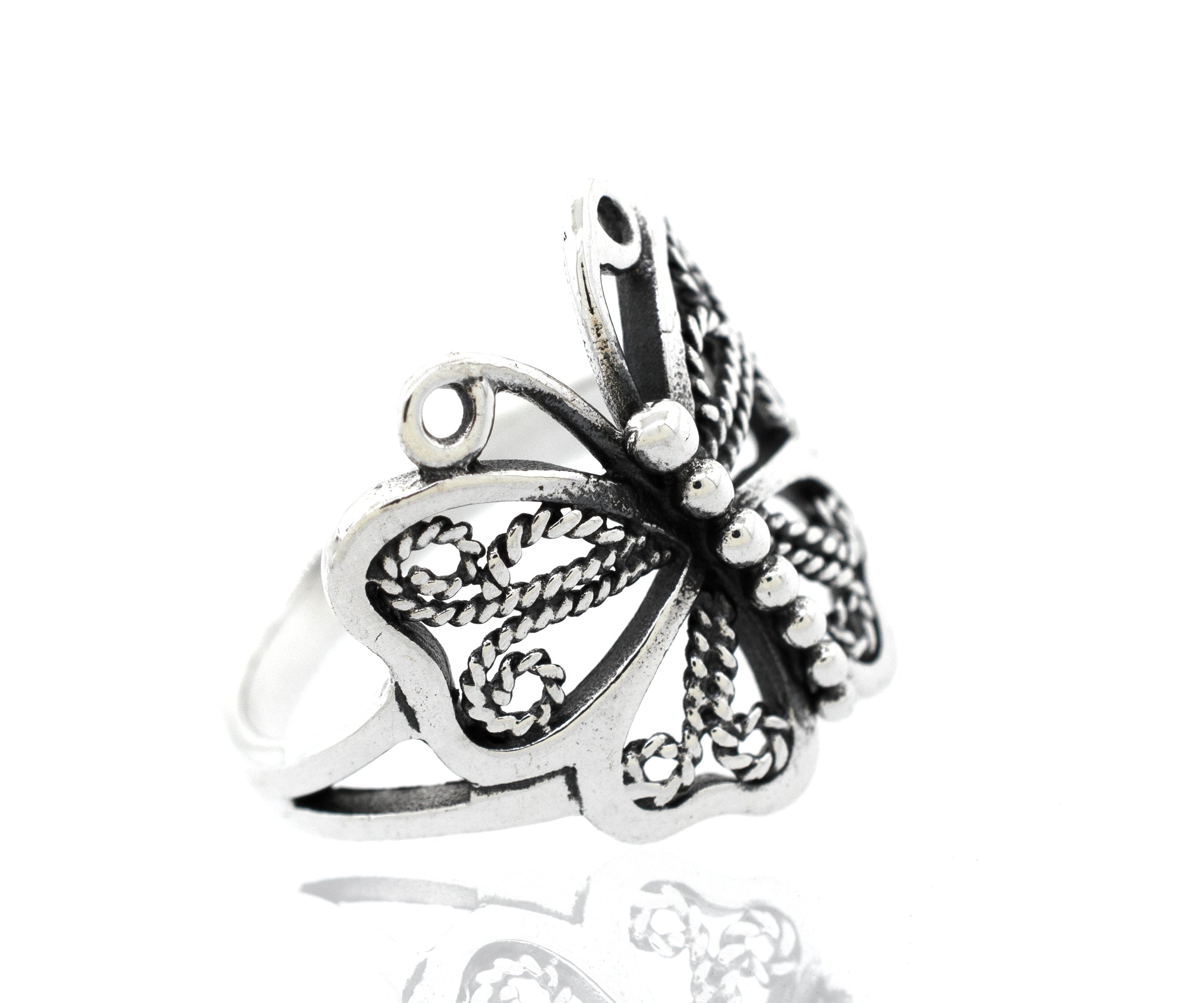 A minimalist Filigree Butterfly Ring on a white background.