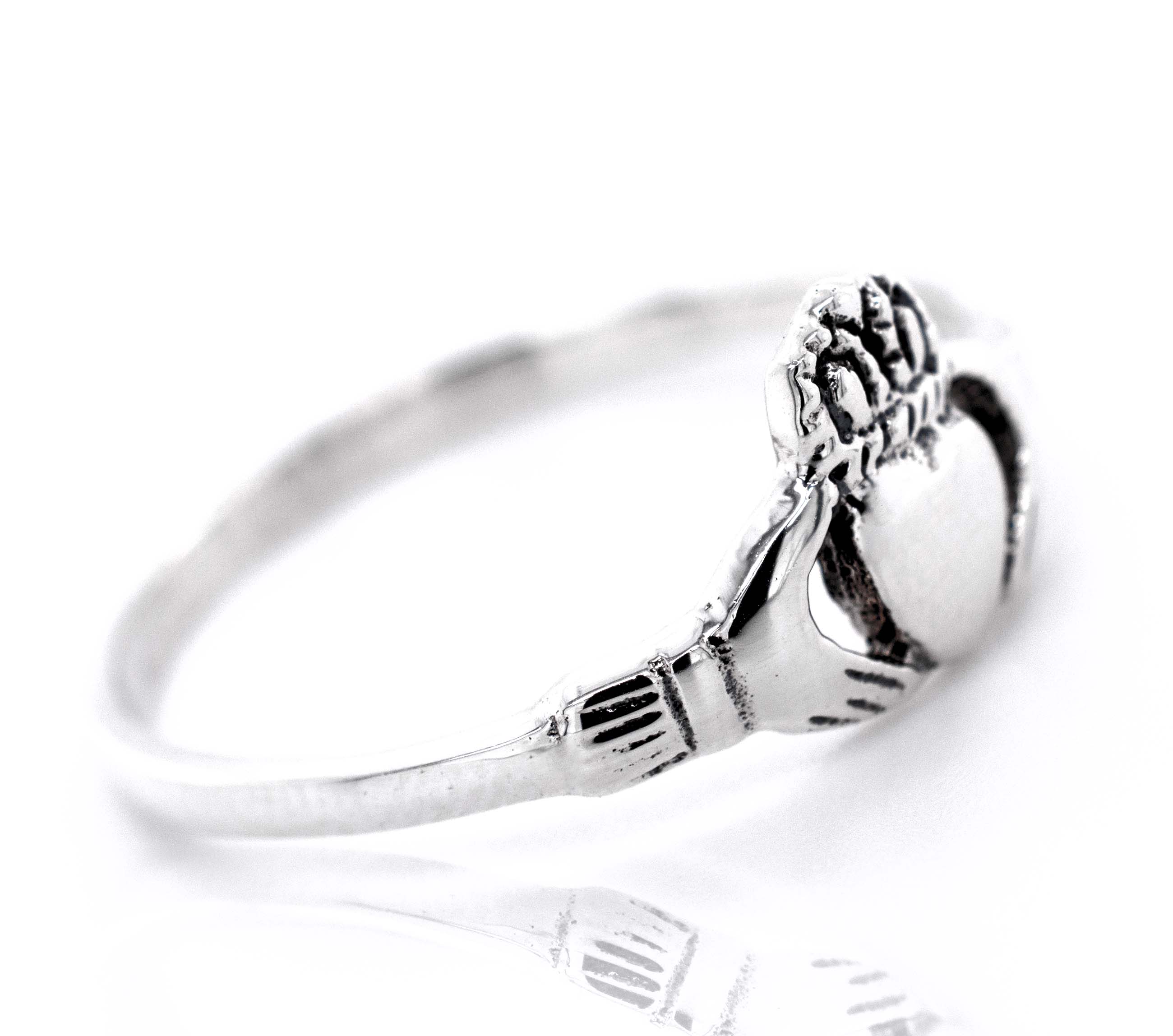 A Celtic Claddagh Ring in sterling silver.