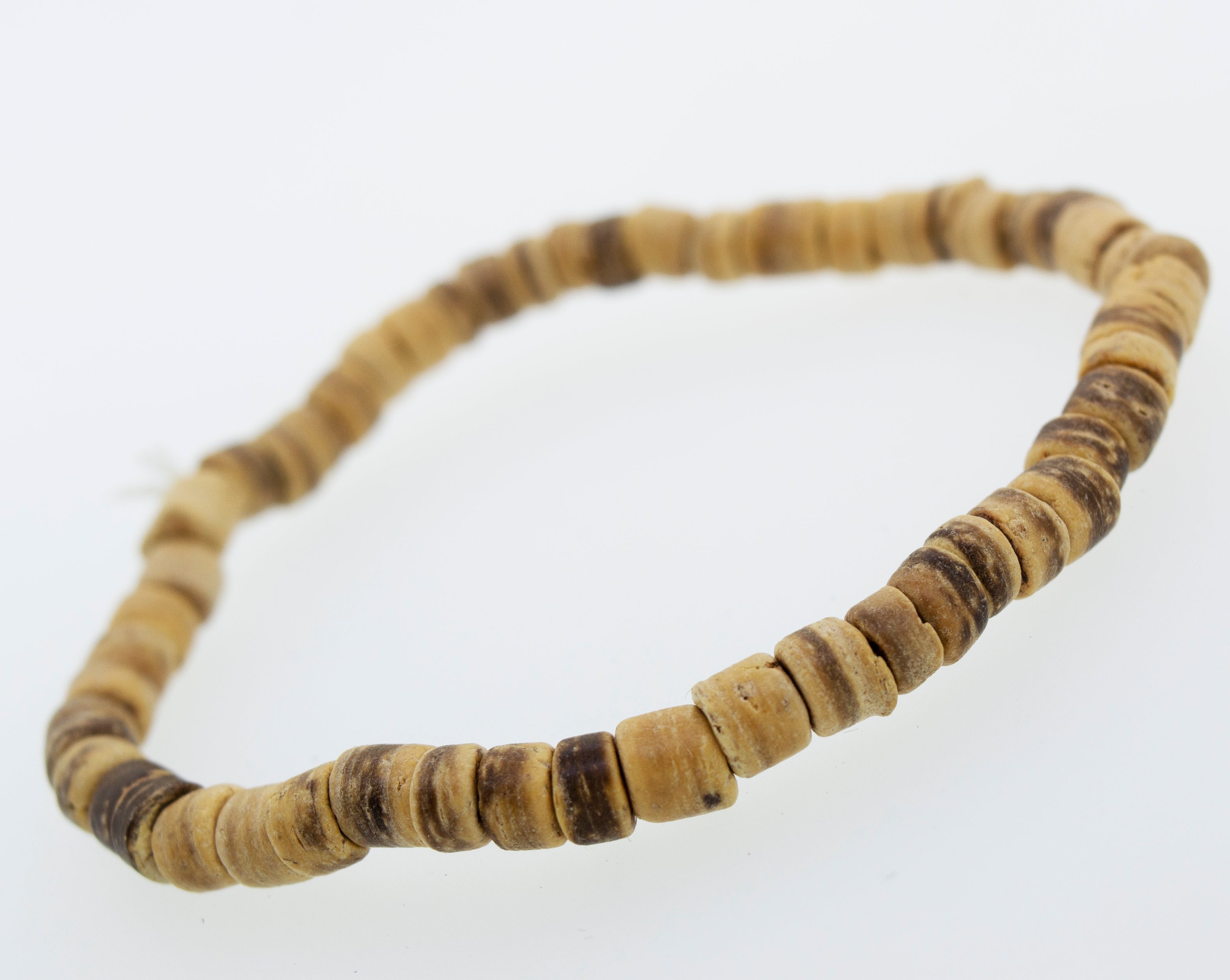 A Three Bracelet Set made of wooden beads, resting on a white surface. (Brand Name: Super Silver)