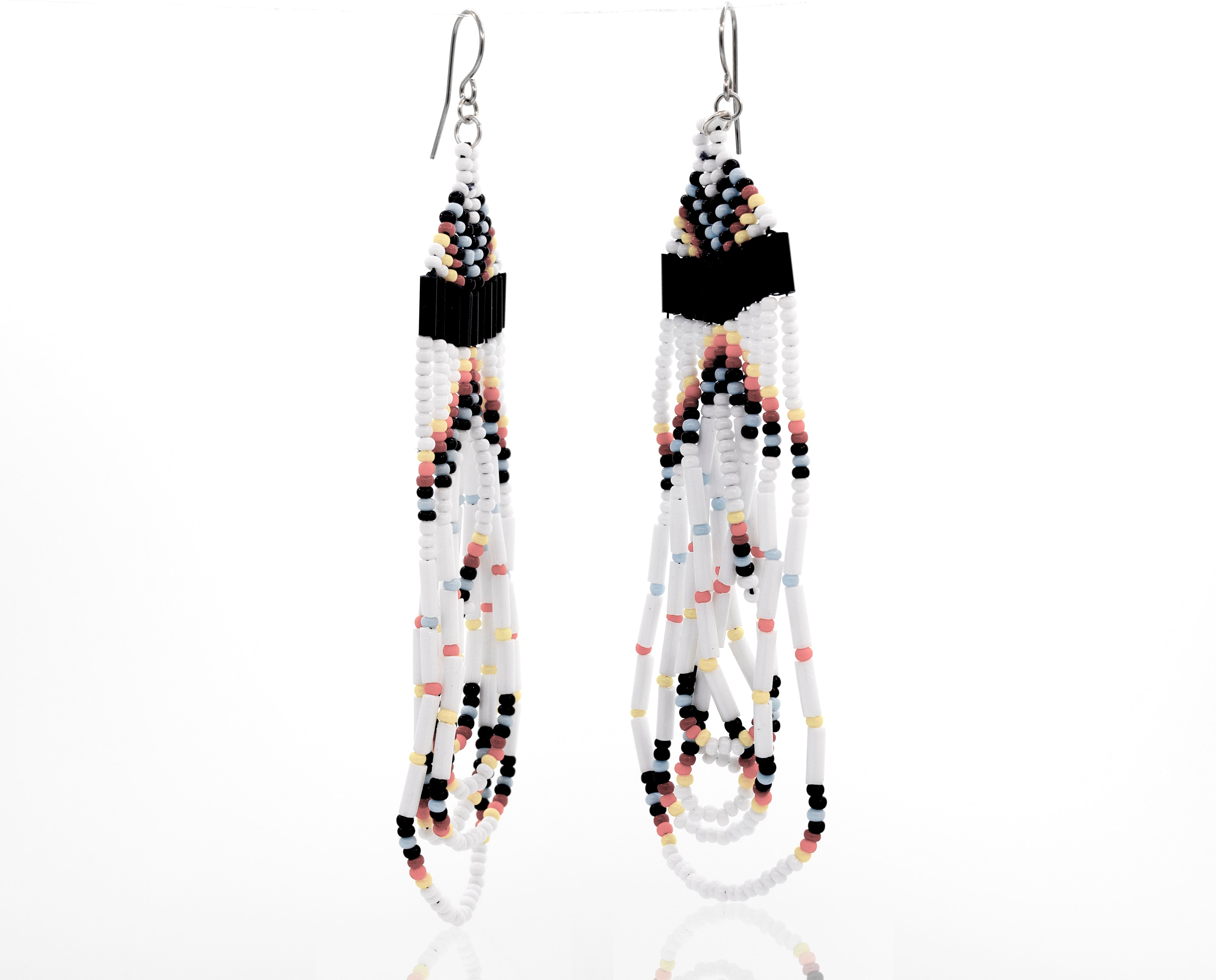 A pair of Super Silver Handmade Multi-Stone Beaded Dangle Earrings featuring black and white beads, handmade with surgical steel posts, showcased on a white surface.