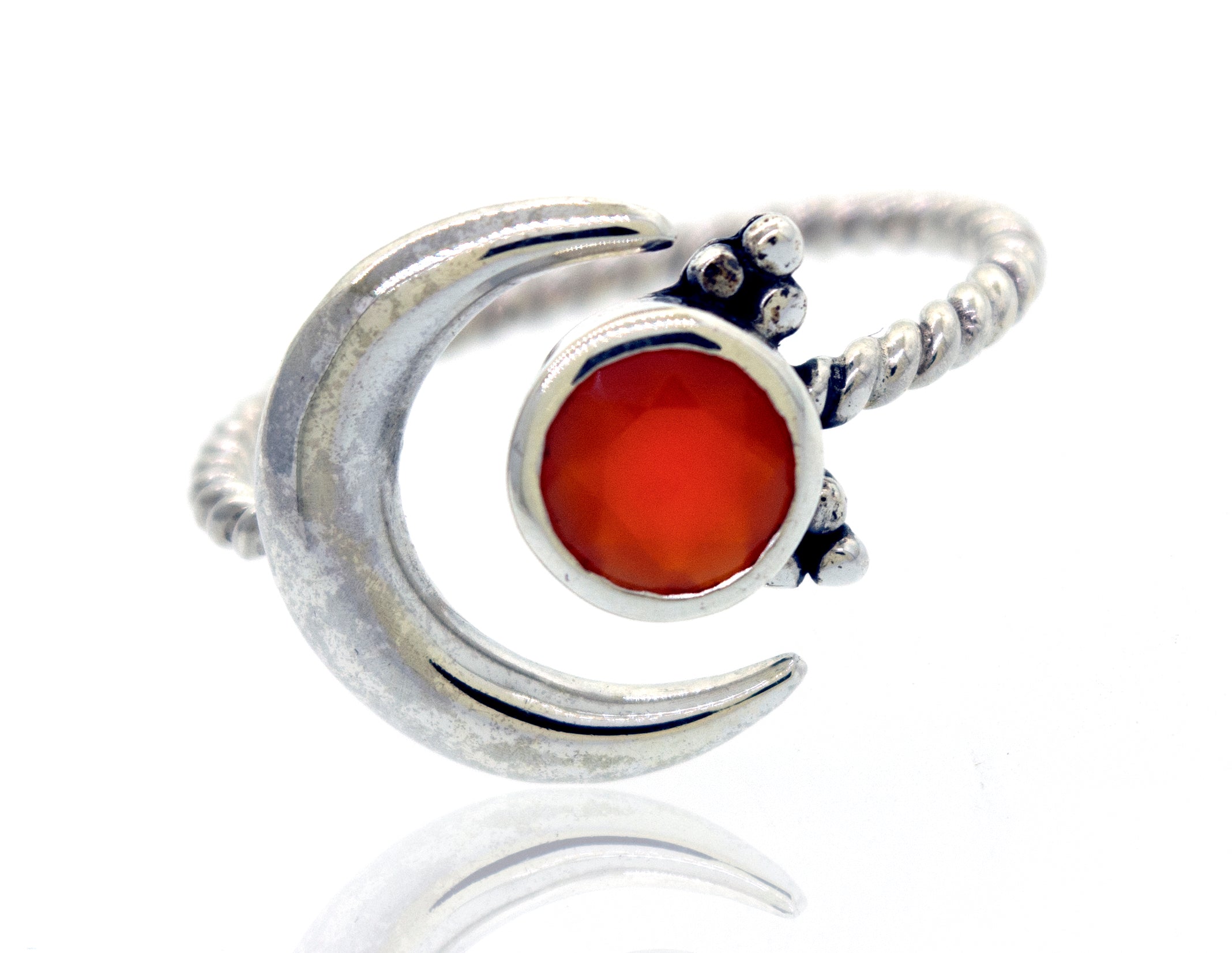 Online Only Exclusive Adjustable Carnelian Moon Ring with a carnelian crystal, accompanied by small sterling silver beads on a twisted band, isolated on a white background.