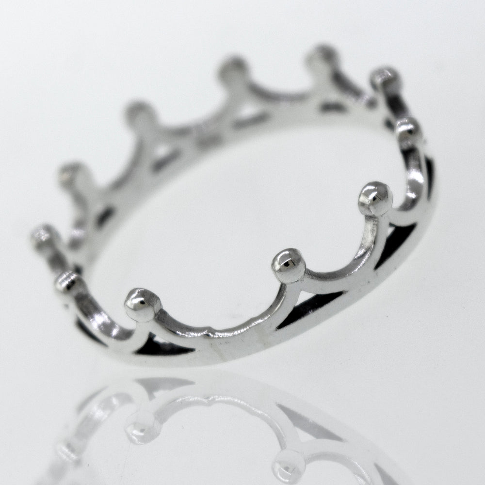 
                  
                    A Super Silver Sterling Silver Crown Ring with a high polish finish, resting on a white surface.
                  
                
