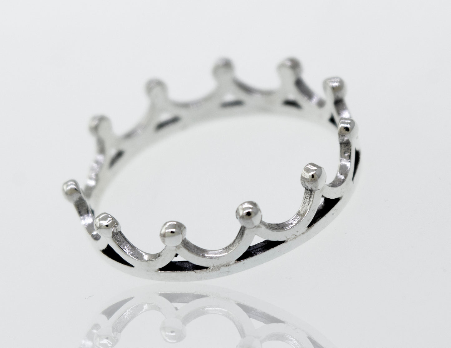 
                  
                    A Super Silver Sterling Silver Crown Ring with a high polish, displayed on a white surface.
                  
                