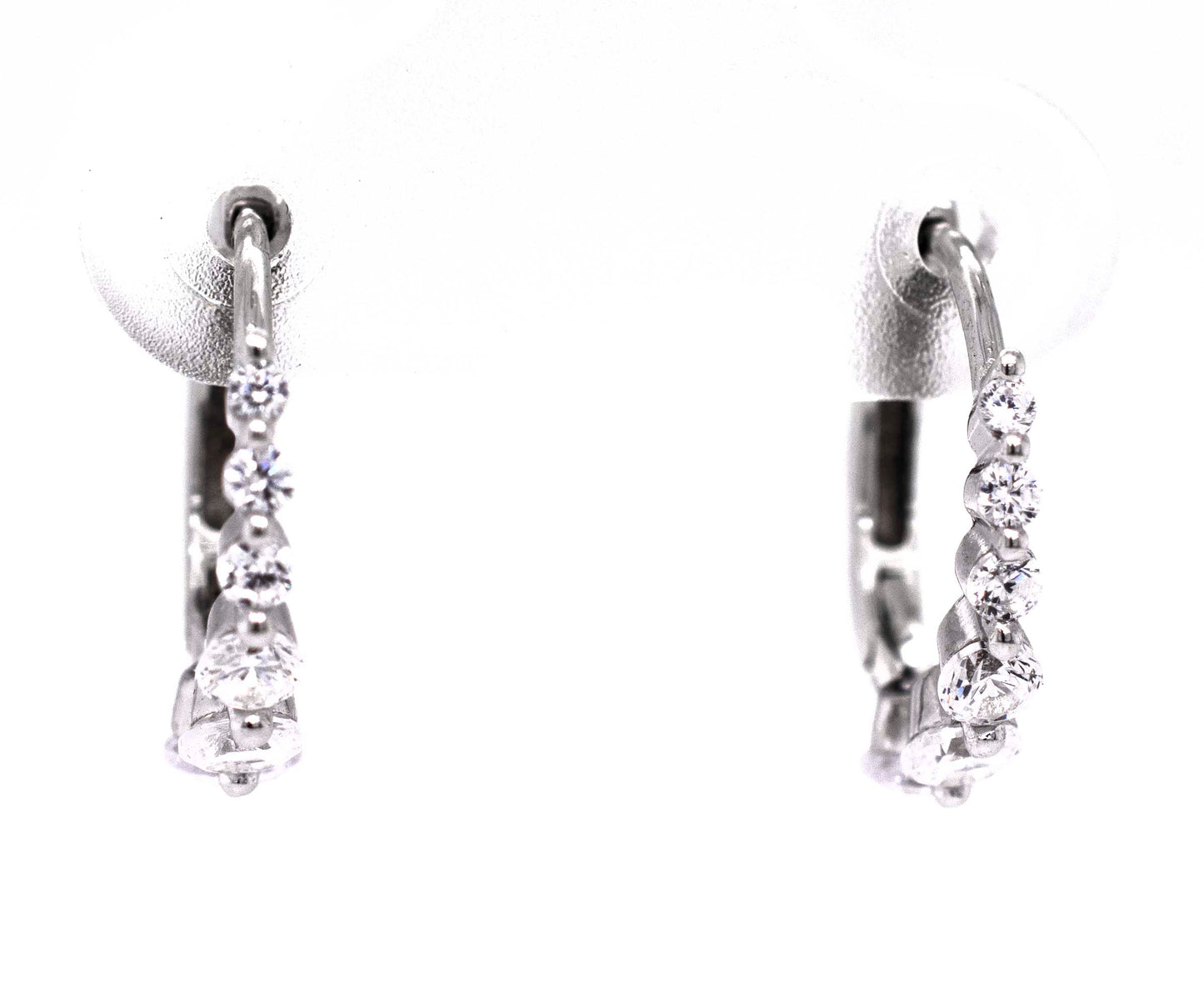 
                  
                    A pair of fashionable Small Cubic Zirconia Hoops, a diamond alternative.
                  
                