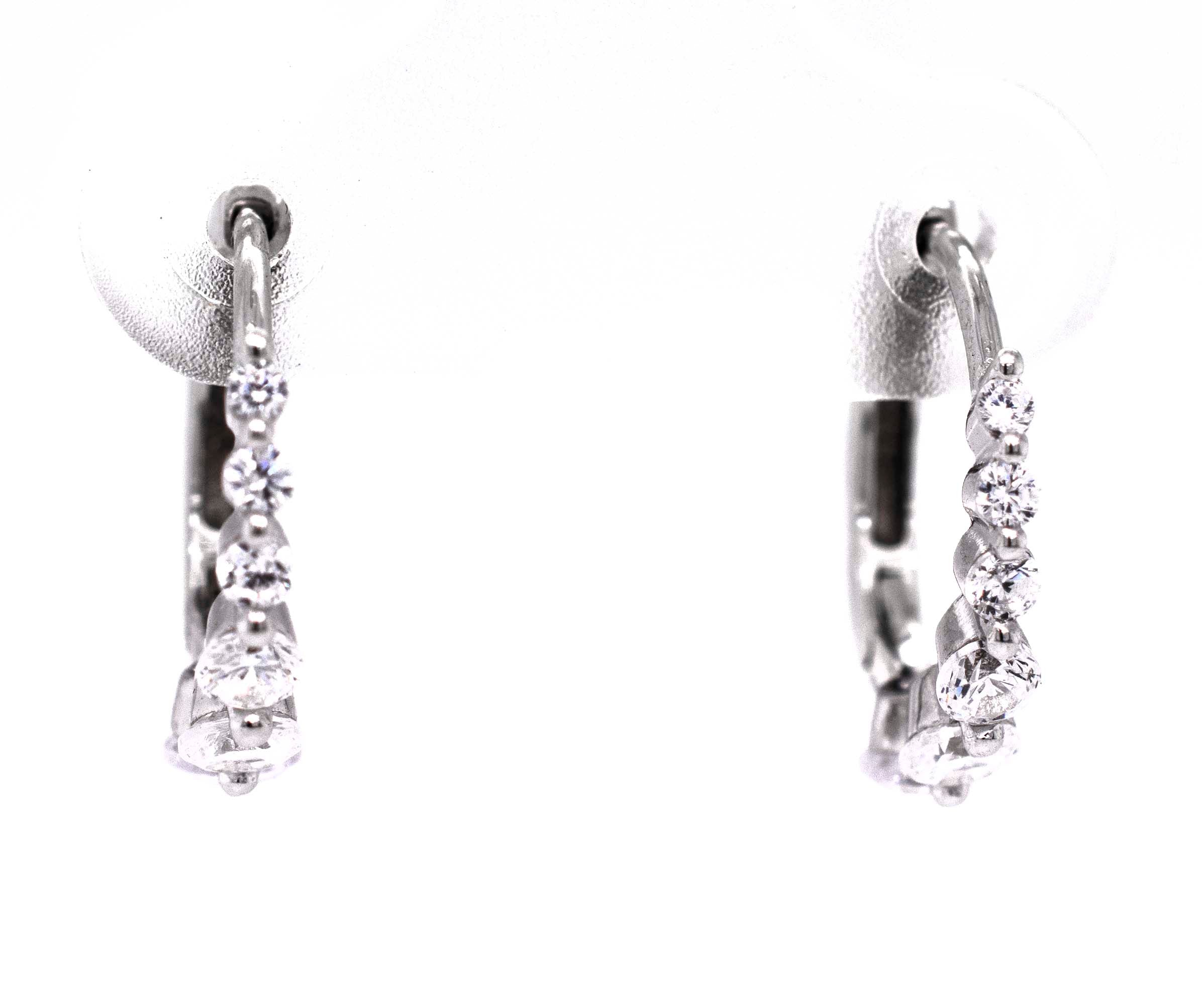 A pair of fashionable Small Cubic Zirconia Hoops, a diamond alternative.