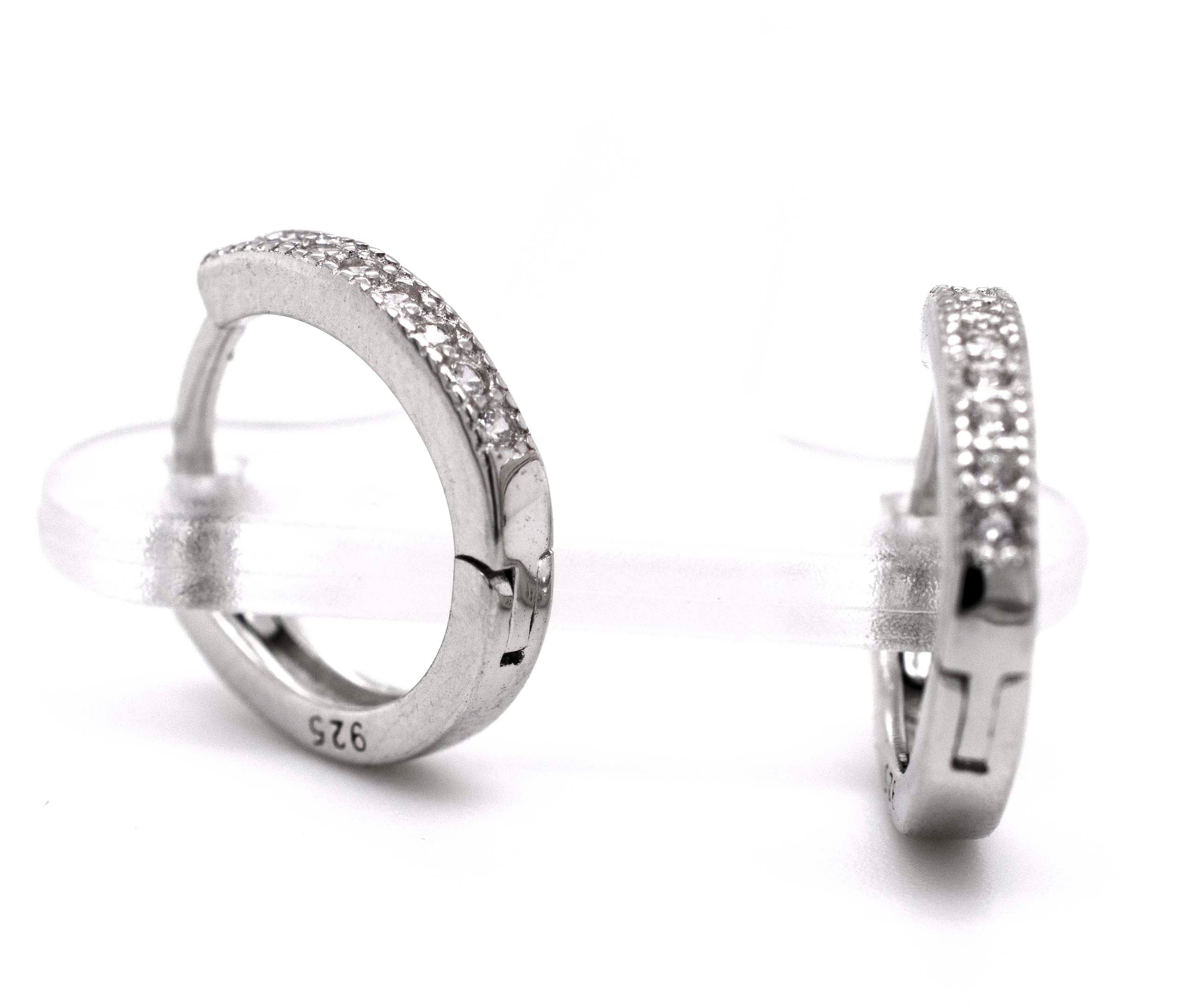 A pair of Super Silver Small Pave Cubic Zirconia Hoops with diamond alternative cubic zirconia.