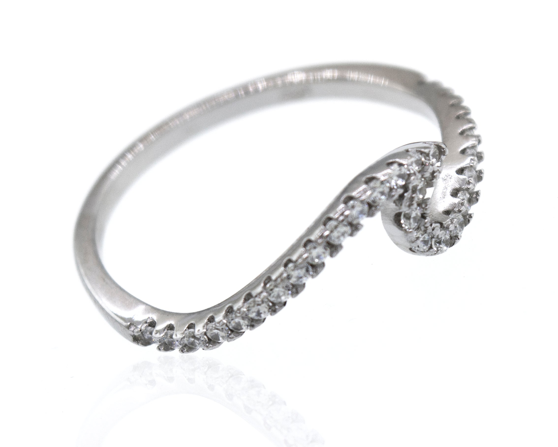 An elegant Pave Wave Ring with diamonds on it.