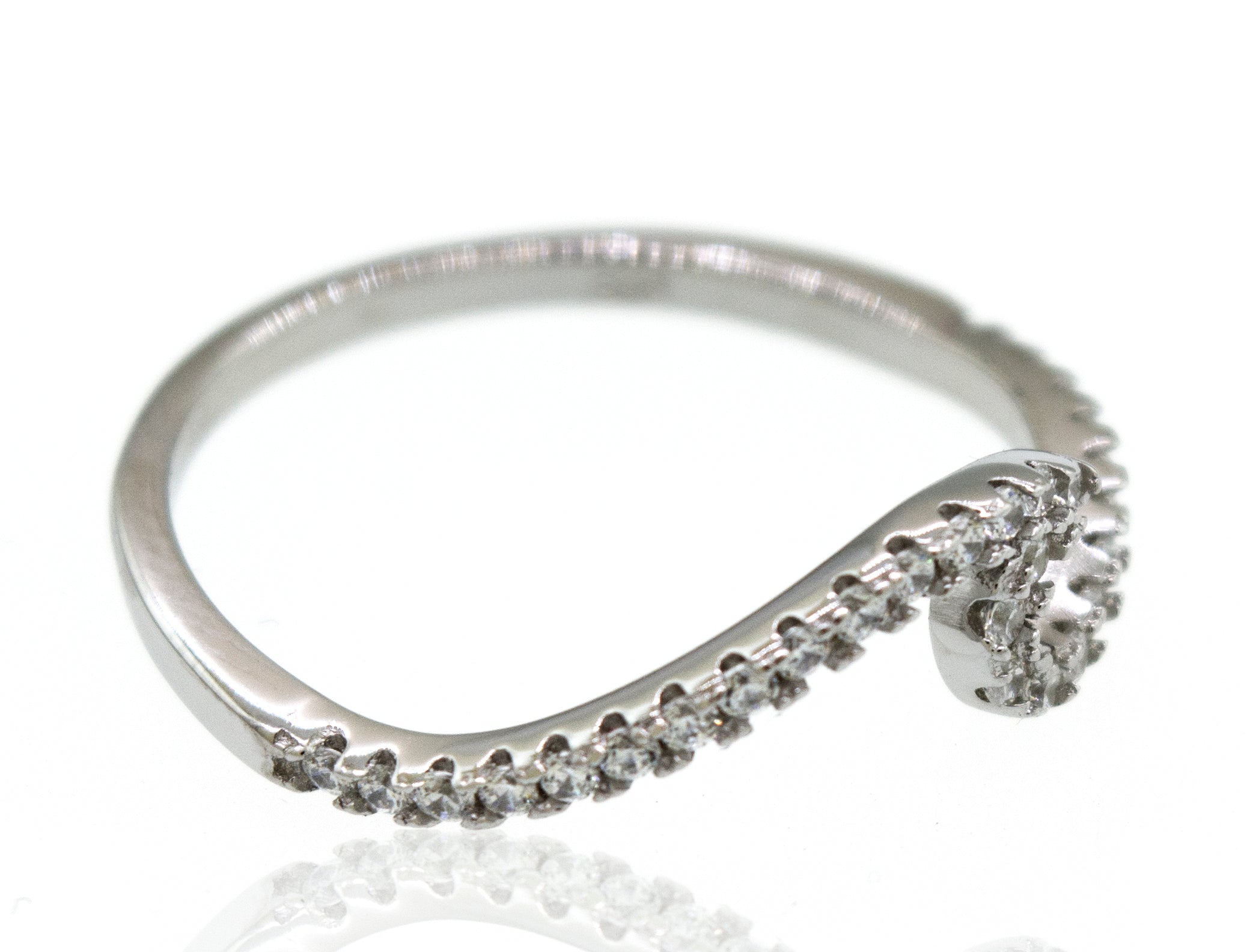 A Pave Wave ring with cubic zirconia diamonds on it.