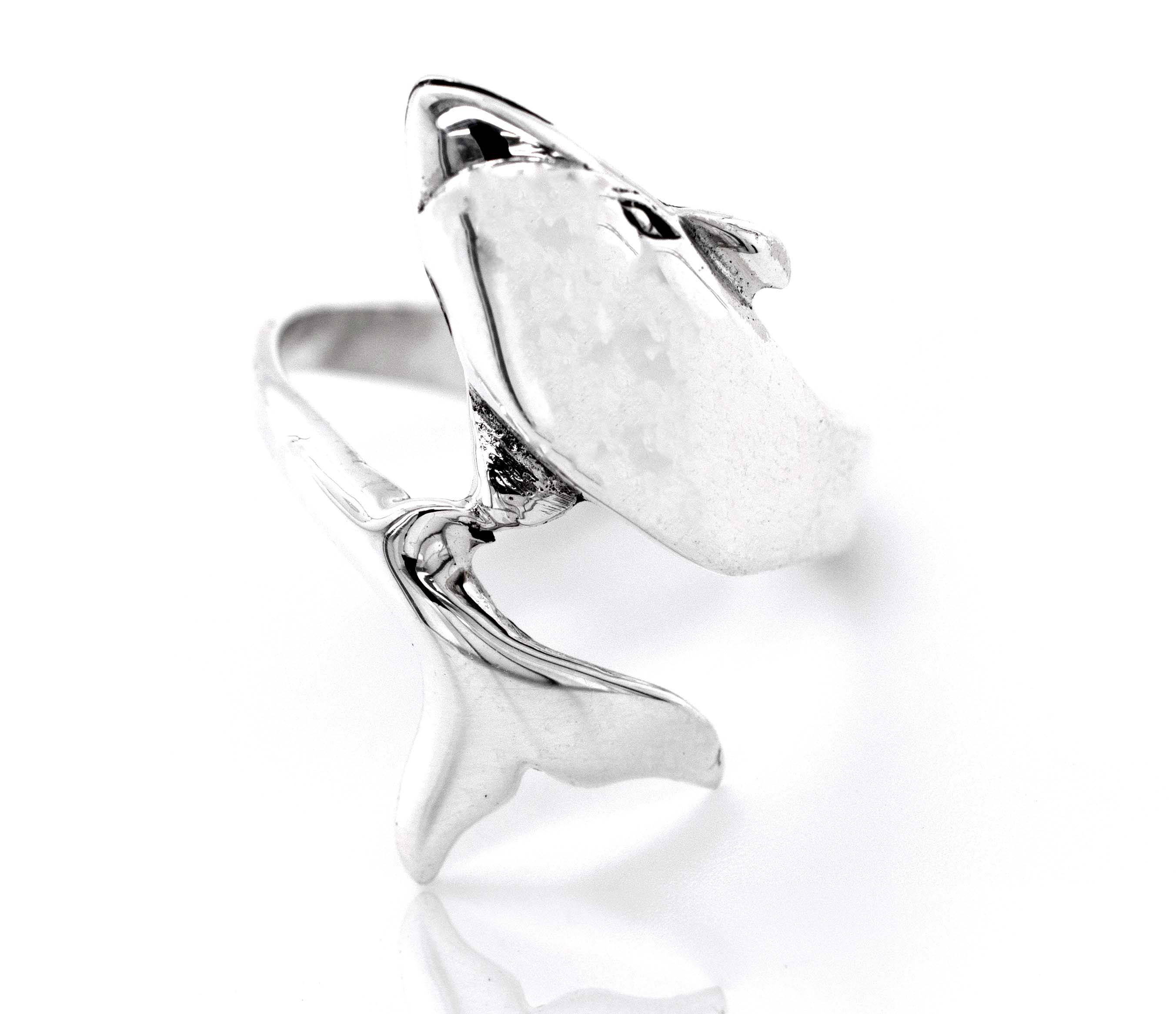 A Dolphin Ring with a dolphin on it.