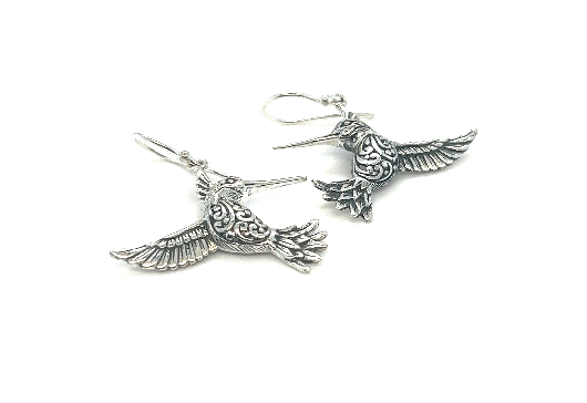 A pair of Super Silver Stunning Handcrafted Hummingbird Earrings from the artisan collection, showcasing the beauty of nature against a white background.