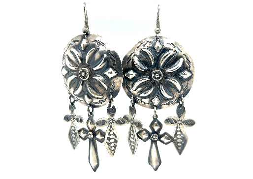 A pair of Super Silver handcrafted silver concho earrings with vintage-styled beauty and southwest charm.