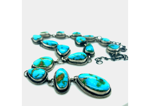 A Stunning Sonora Gold Lariat Necklace And Earrings Set adorned with Sonora gold turquoise stones, featuring a handmade textured rope design by Super Silver.