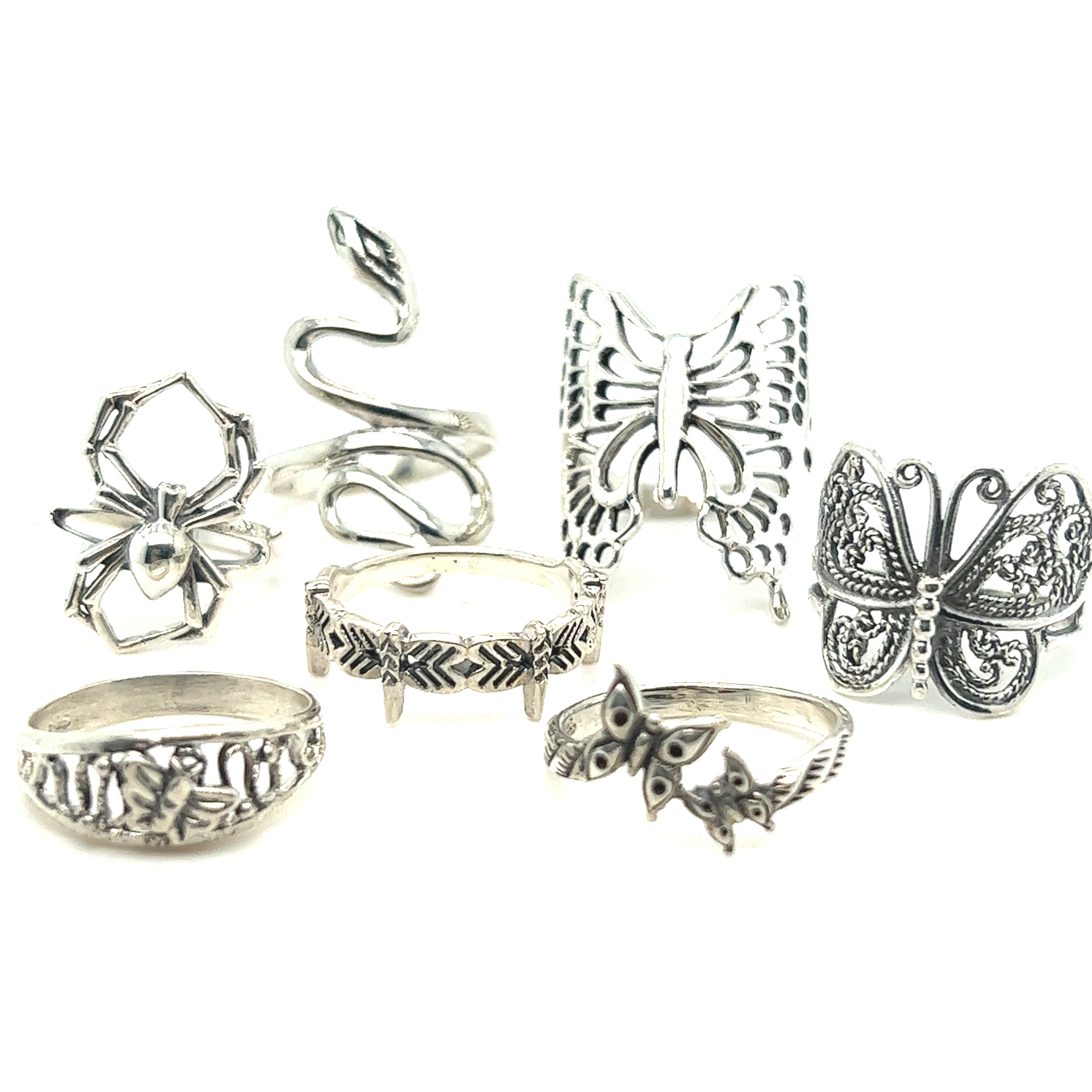 A group of Dainty Double Butterfly Rings.