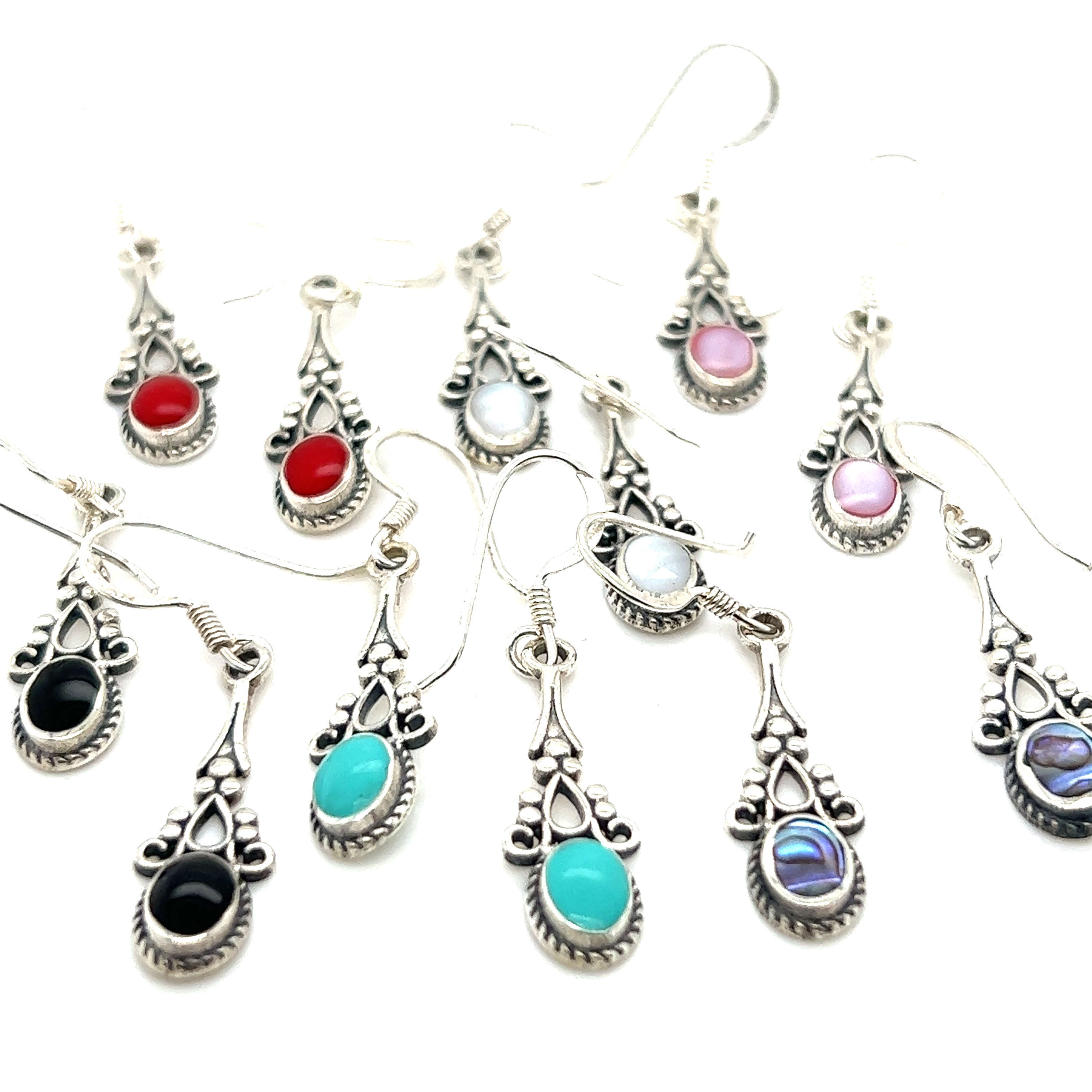 A collection of Super Silver oval-shaped inlaid stone earrings with a delicate vintage setting, perfect for achieving a boho look or adding an earthy refinement to any outfit.