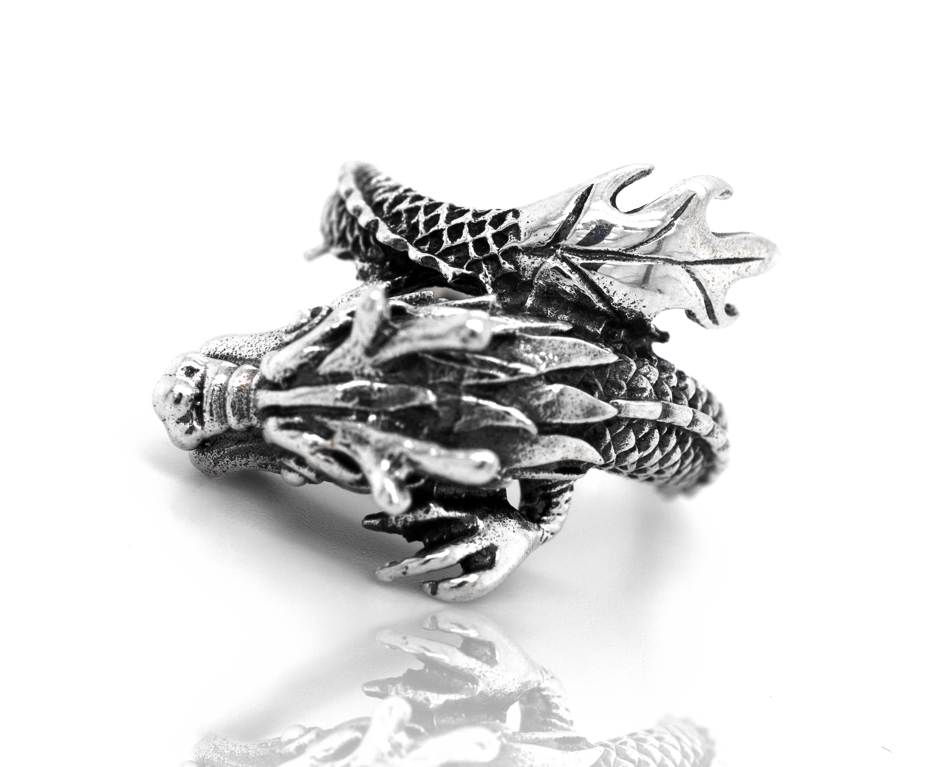 A mythical Striking Silver Dragon Ring, suitable for men, with a dragon head design.