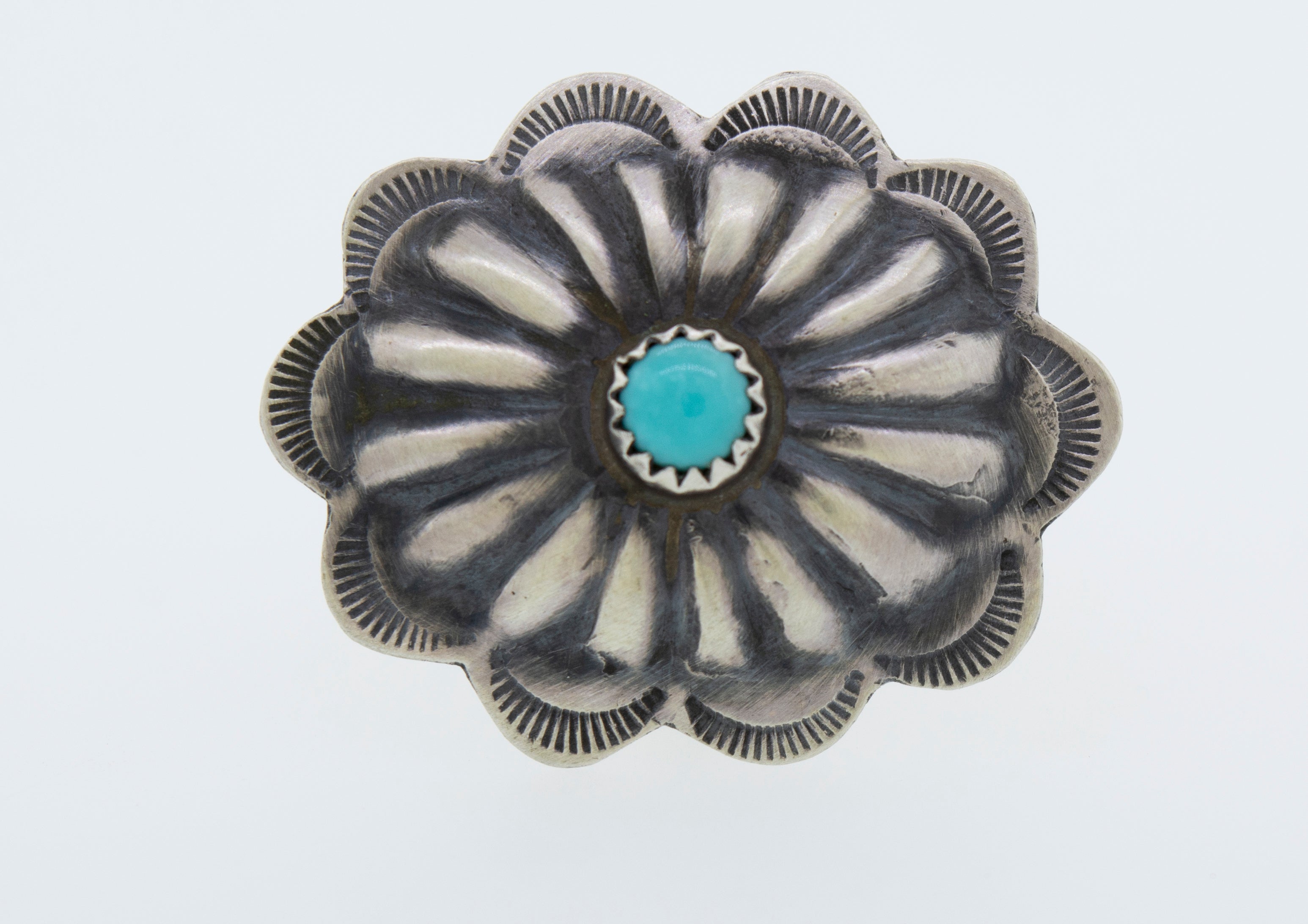 A cultural and native inspired Native American Turquoise Flower Ring.