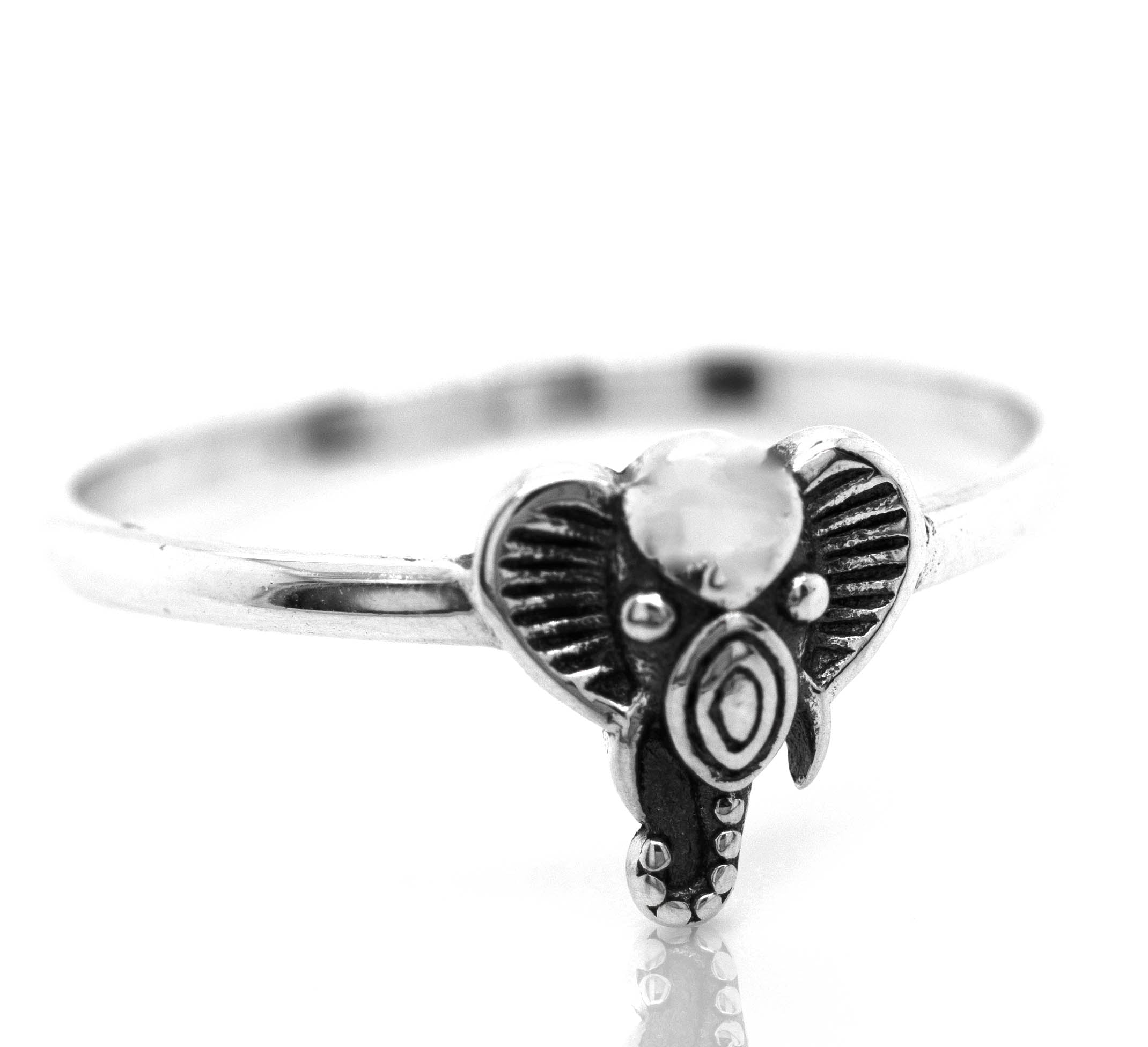 An earthy vibe Super Silver Tribal Elephant Head Wire Ring with a white stone, perfect for those who love the boho-minimalist style.