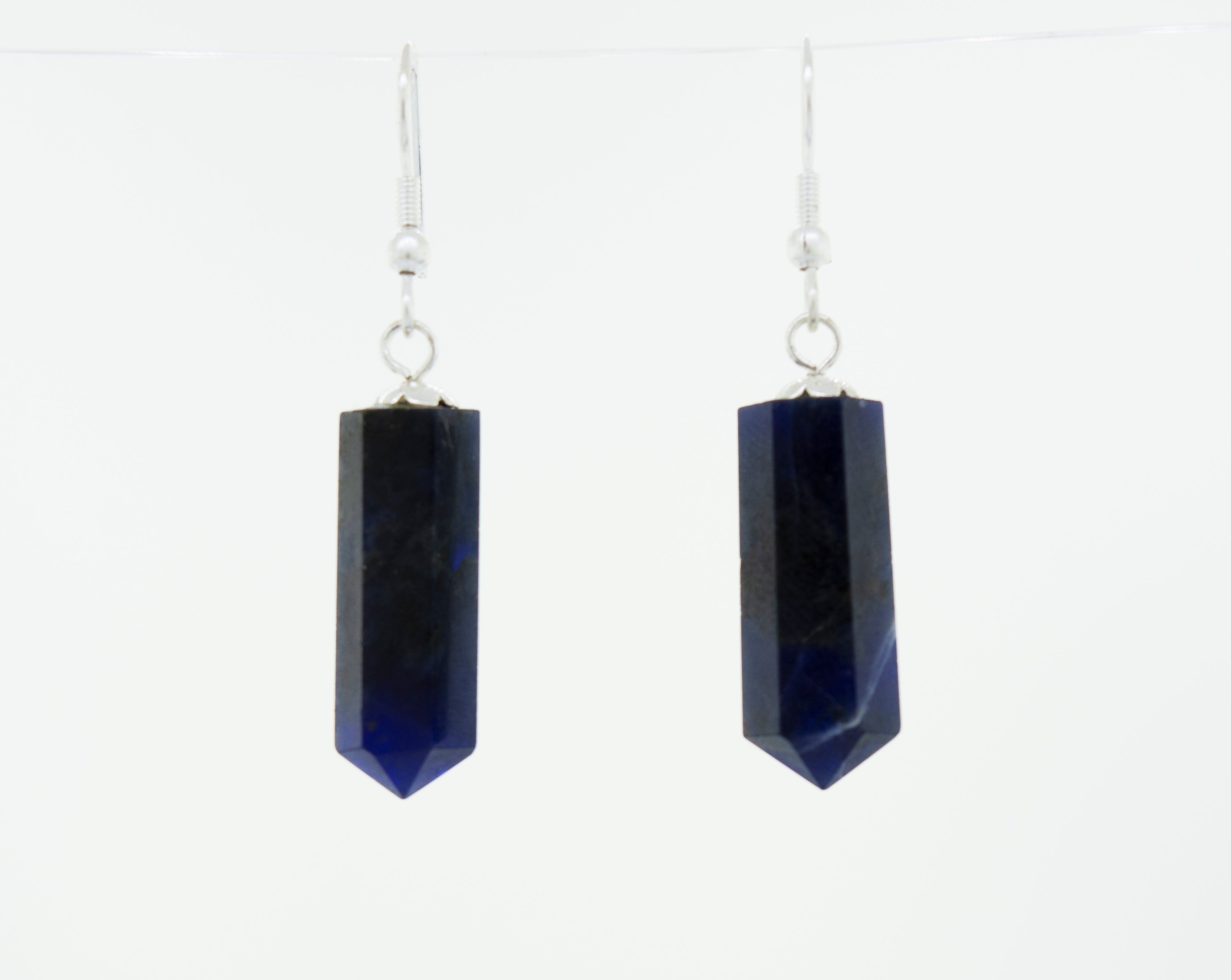 Super Silver's Raw Stone Earrings feature a raw cut Lapis Lazuli stone in an obelisk shape.