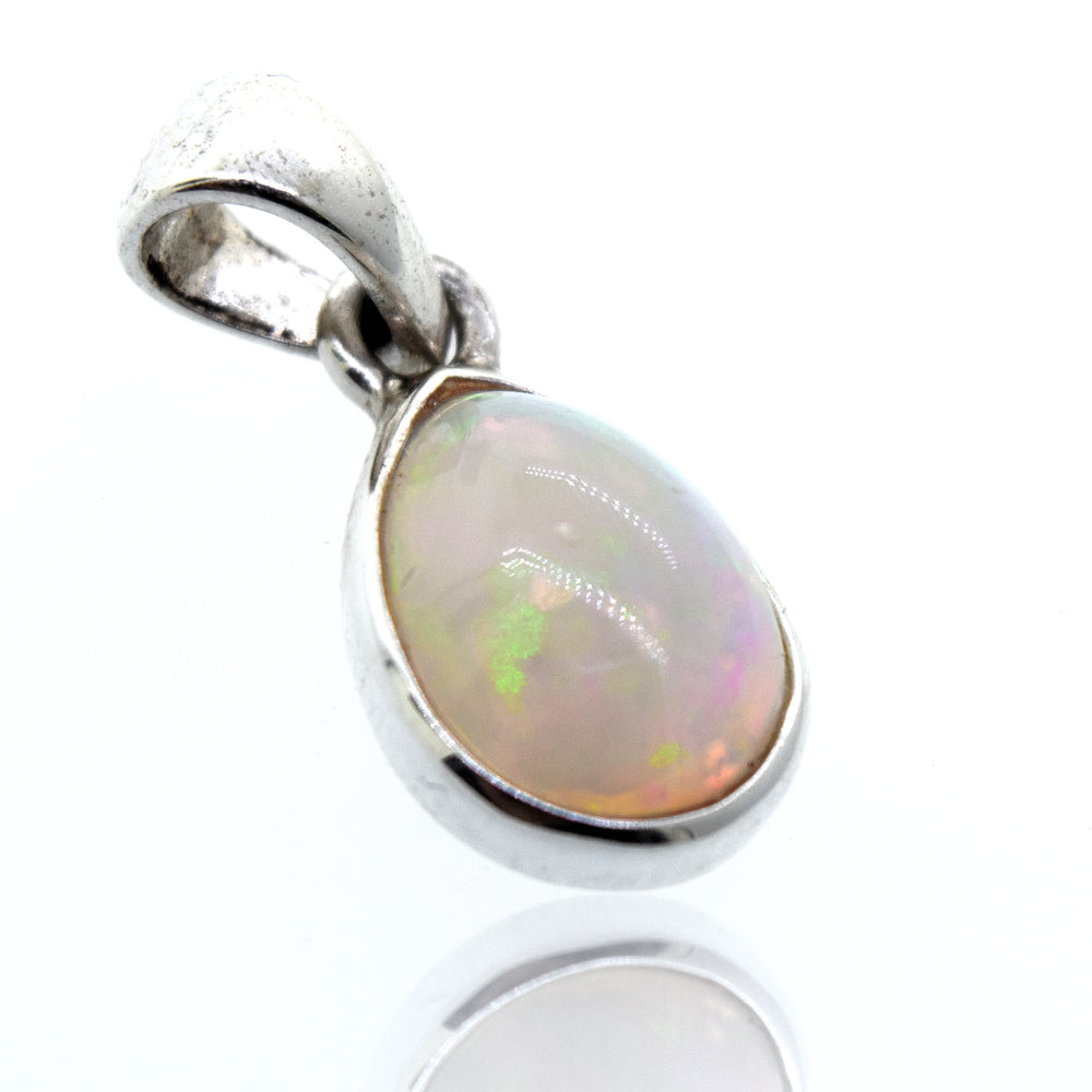 
                  
                    Description: A Magical Ethiopian Opal pendant by Super Silver on a white background.
                  
                