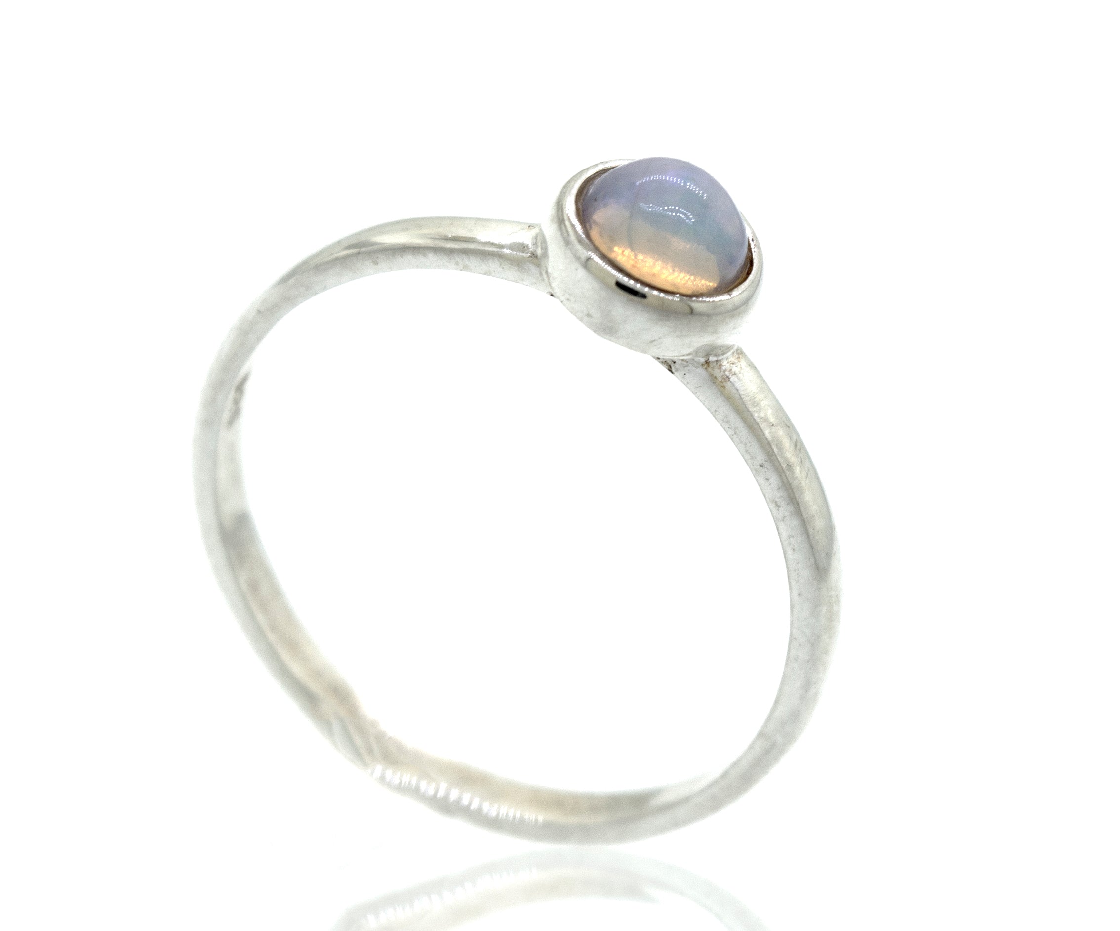 An elegant sterling silver engagement ring with a stunning Glowing Ethiopian Opal Ring, making it a perfect statement piece.