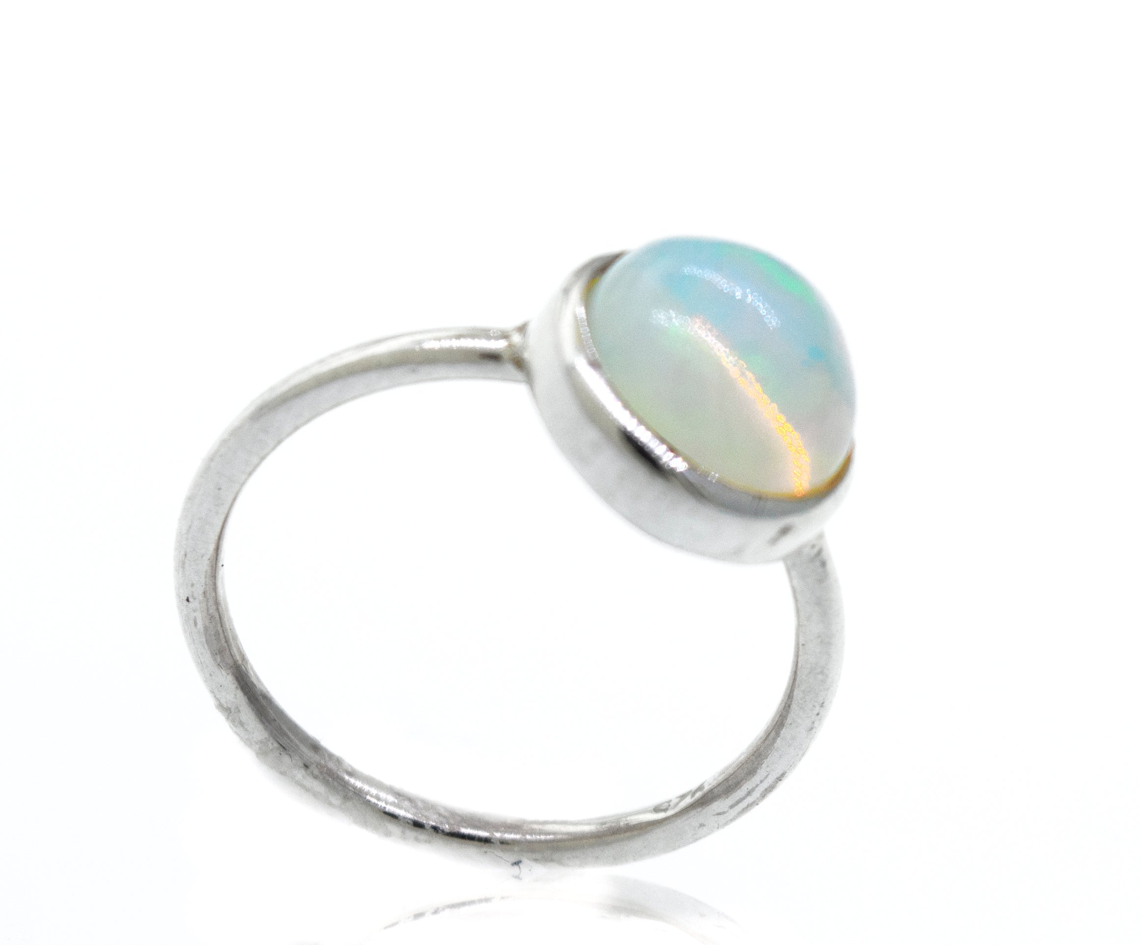 An elegant Round Ethiopian Opal Ring on a white background.