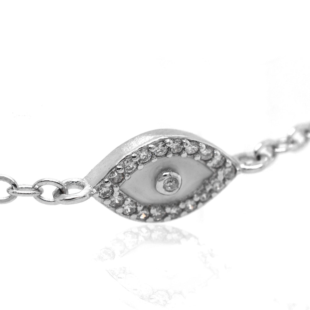 A Trendy Pave Cubic Zirconia Evil Eye Bracelet with cubic zirconia stones by Super Silver.