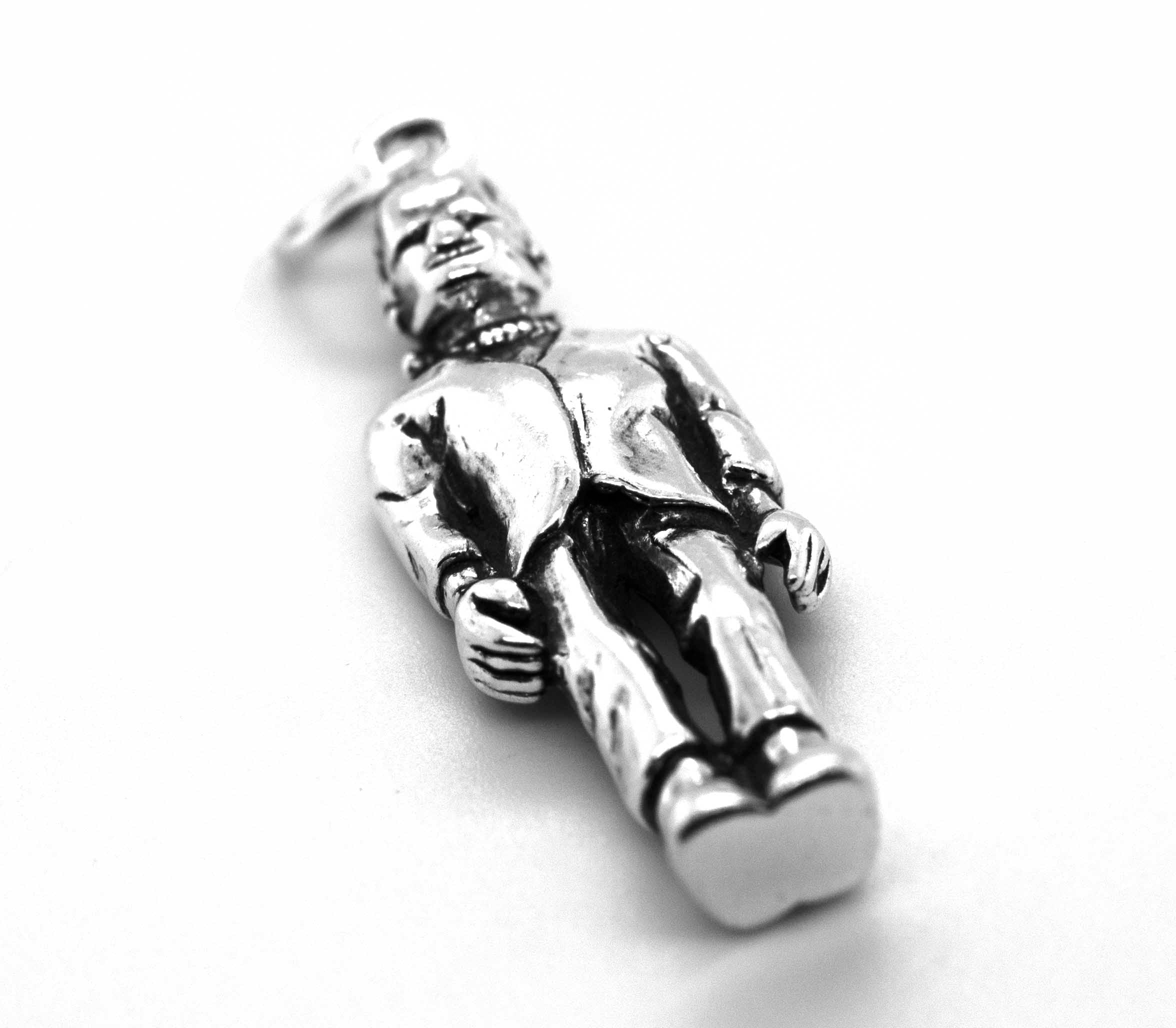 A Super Silver pendant featuring Frankenstein's Monster.