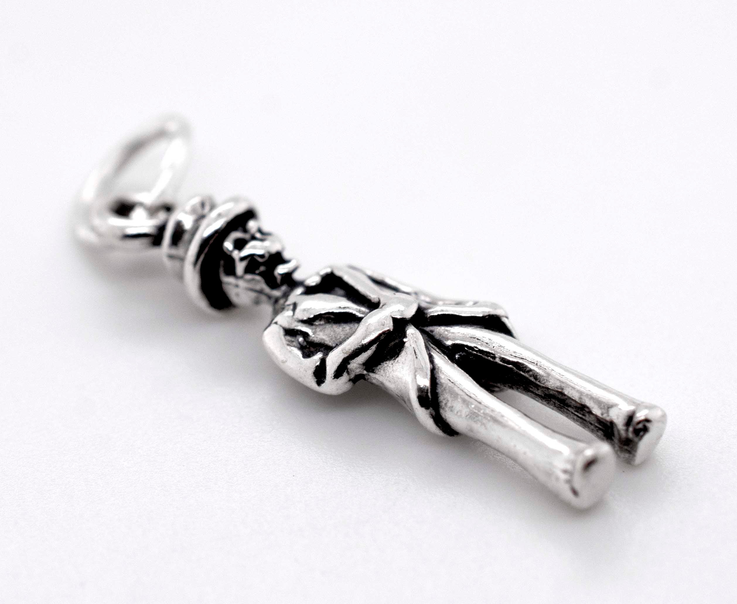A Super Silver Skeleton Groom Charm displayed on a white surface, perfect for the Halloween season.