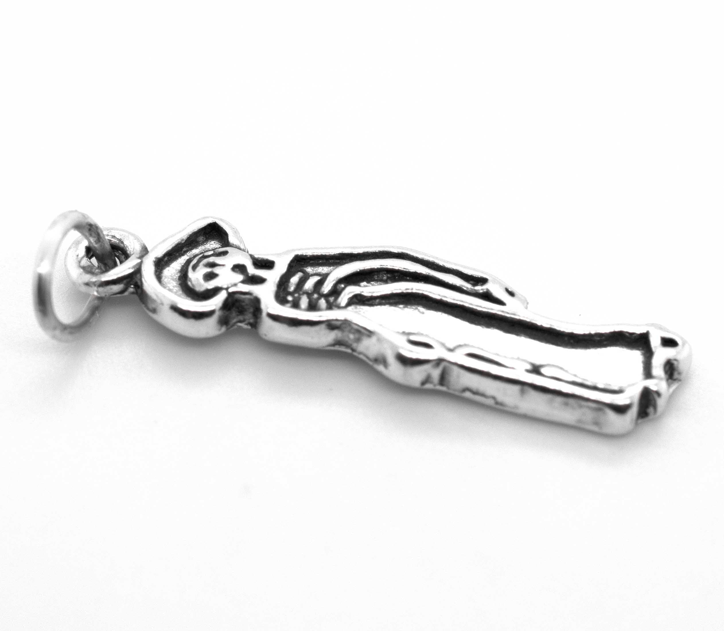 A Super Silver Dia De Los Muertos Female skeleton charm crafted from .925 sterling silver.