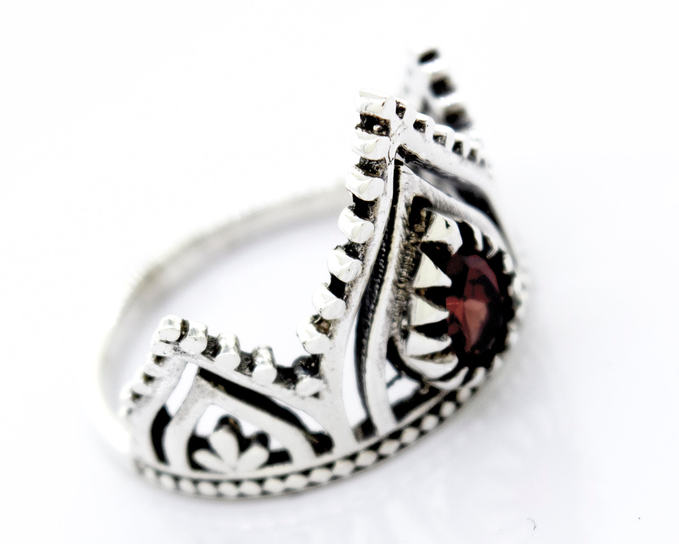 A Super Silver Sterling Silver Crown Ring With Teardrop Shape Garnet.