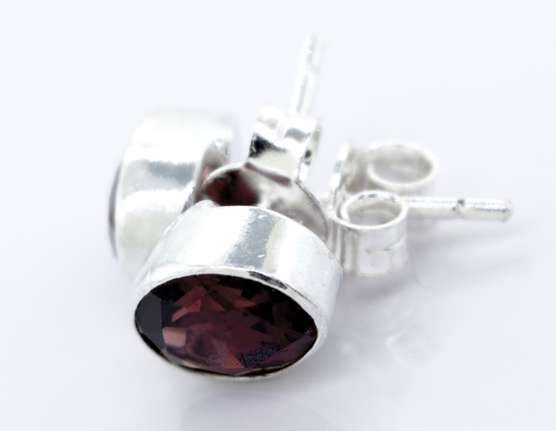 A pair of Garnet Studs With Plain Sterling Silver Setting from Super Silver.