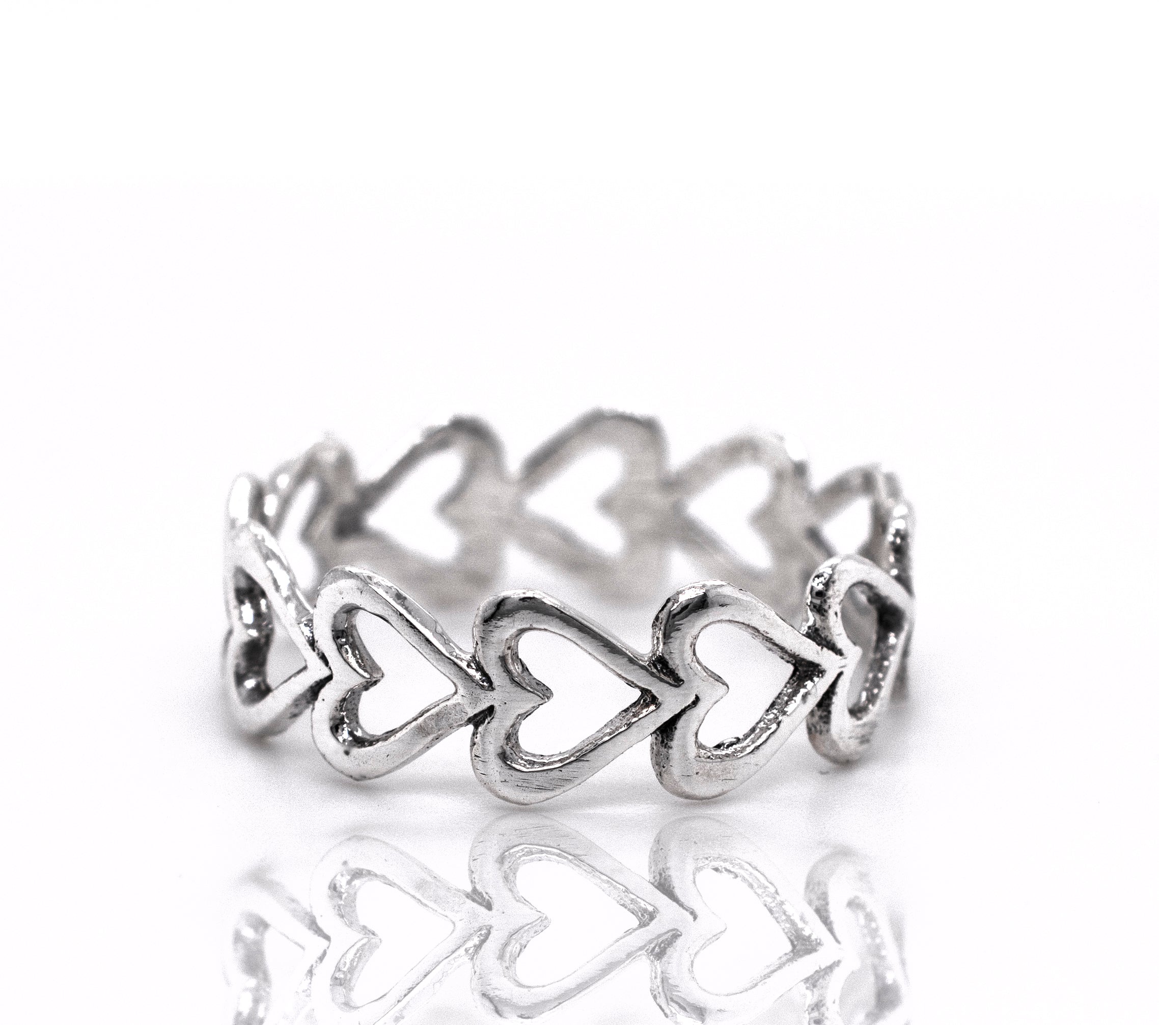 A minimalist Horizontal Cut-Out Heart Band on a white surface.