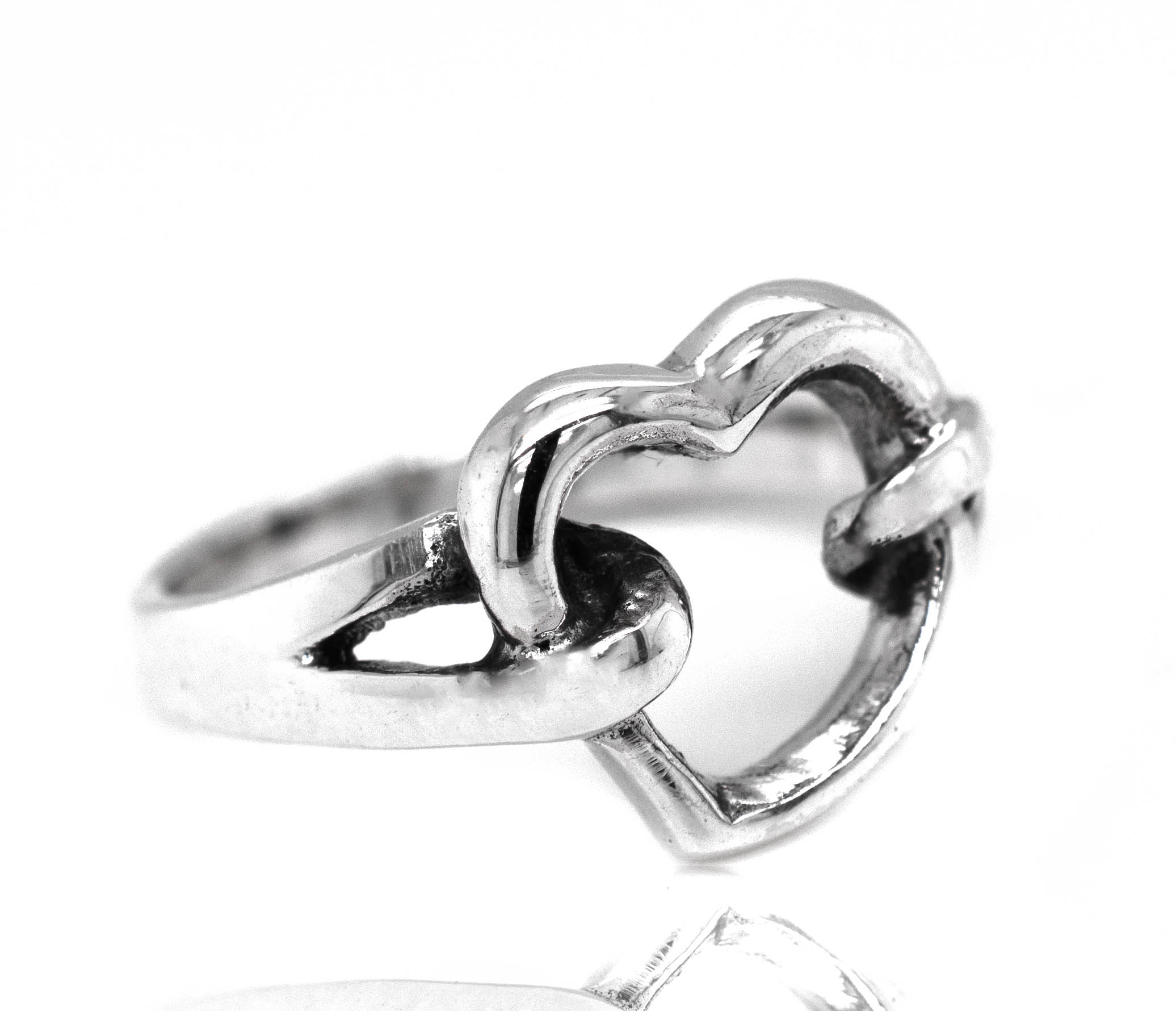 An Open Heart Double Knot Ring on a white background.