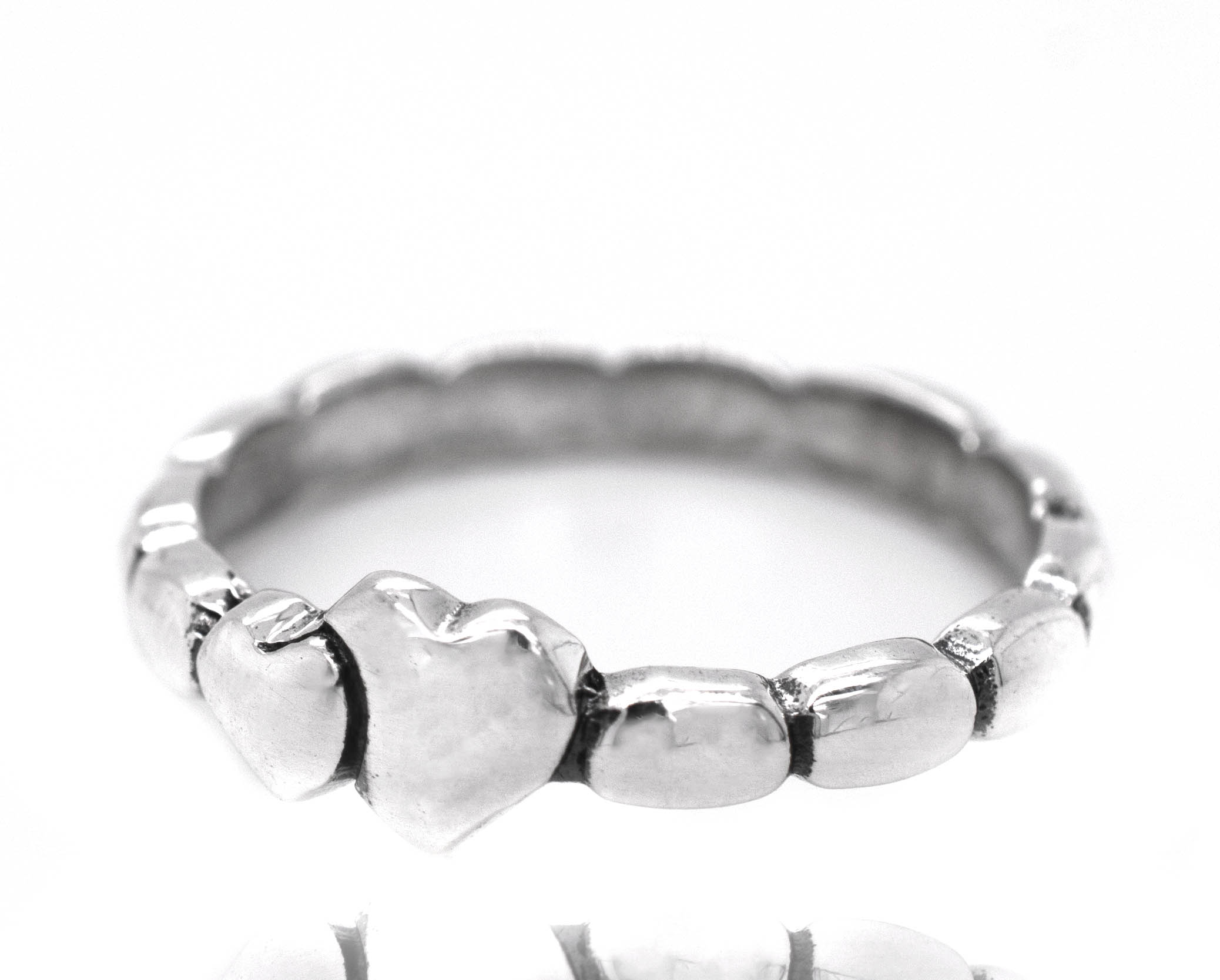 A minimalist Dainty Double Heart Band engagement ring.