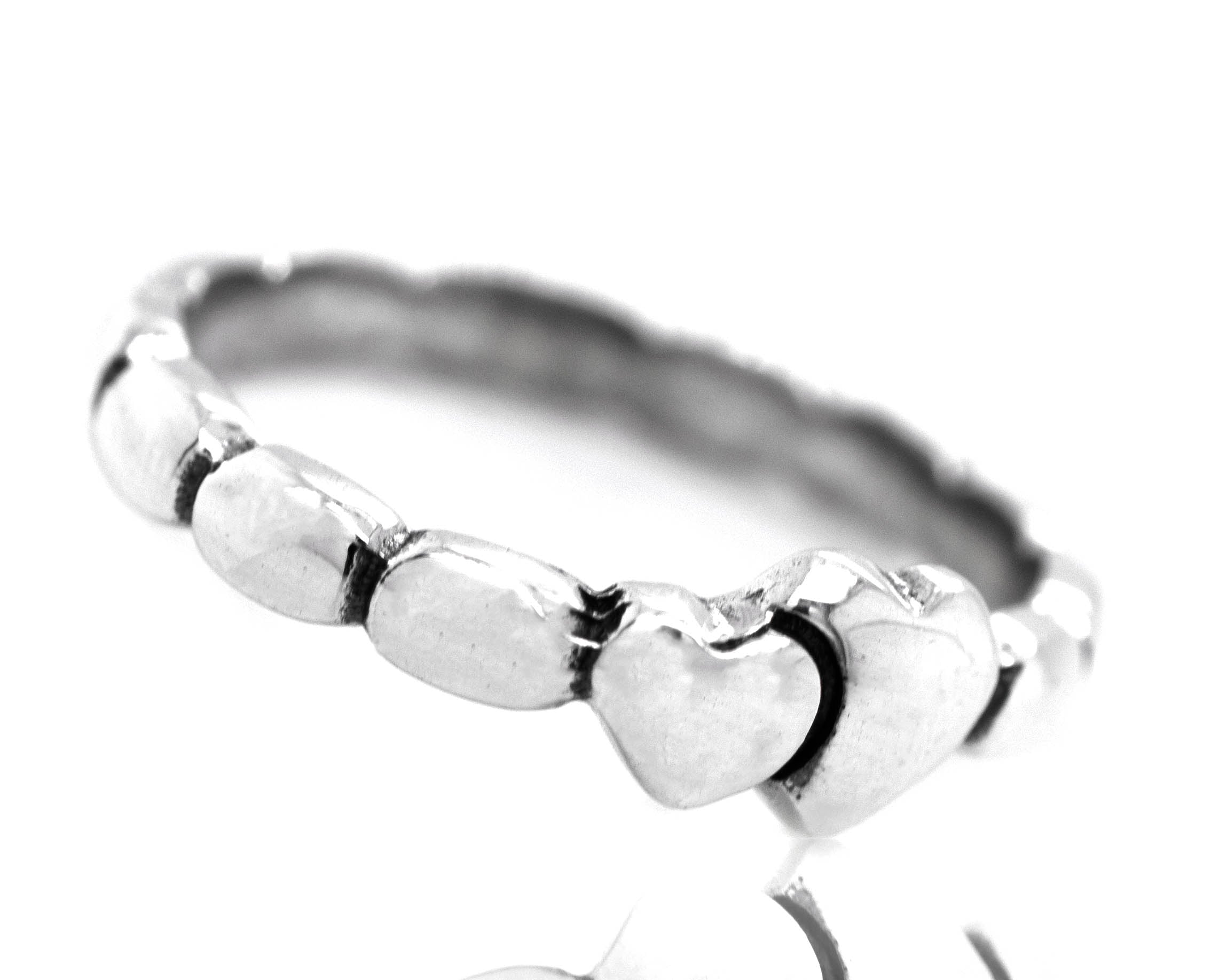 A Dainty Double Heart Band, symbolizing love and affection.