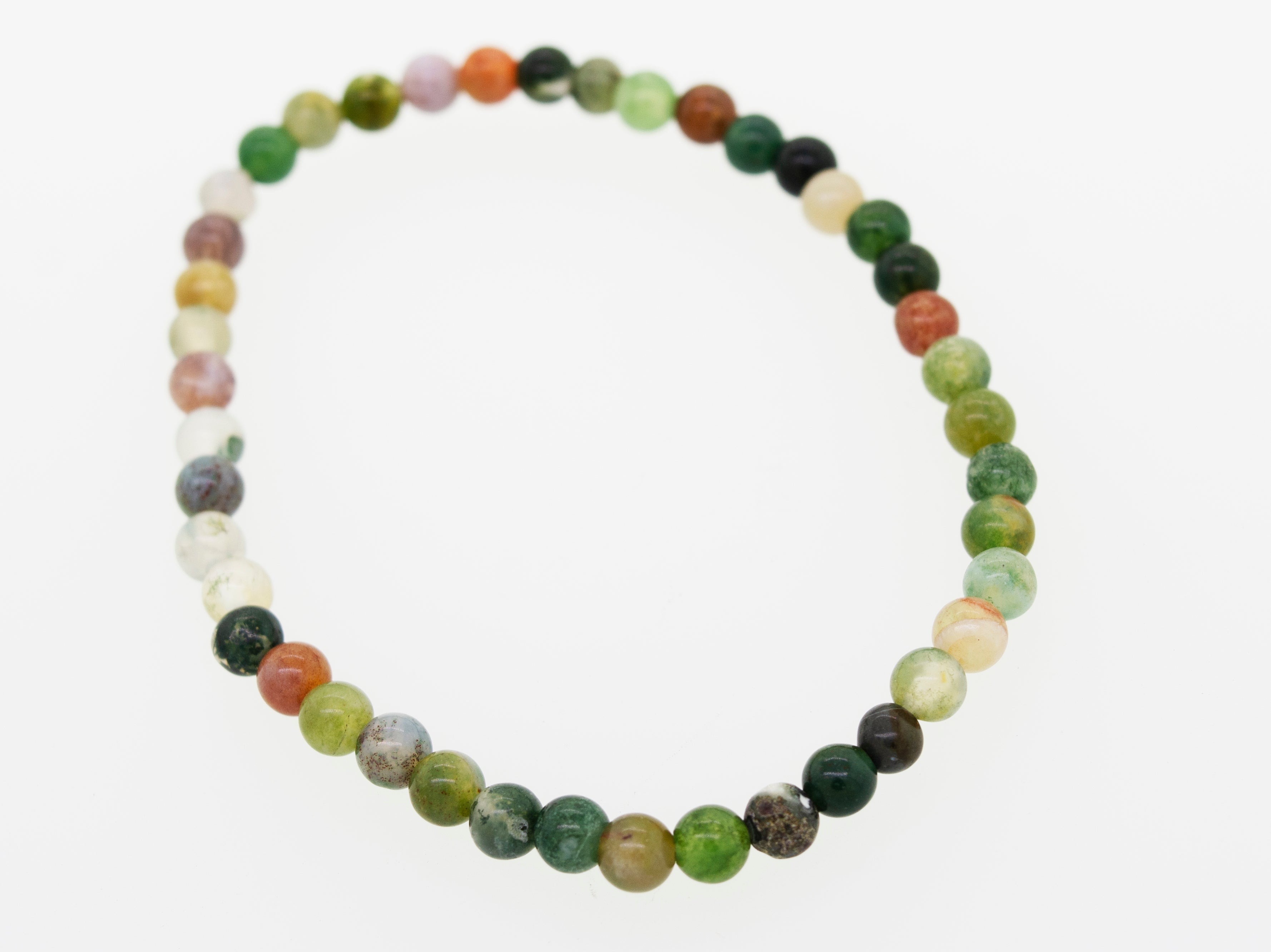 A Super Silver small stone beads bracelet featuring six different colored beads on a white background, secured by an elastic polyester chord.