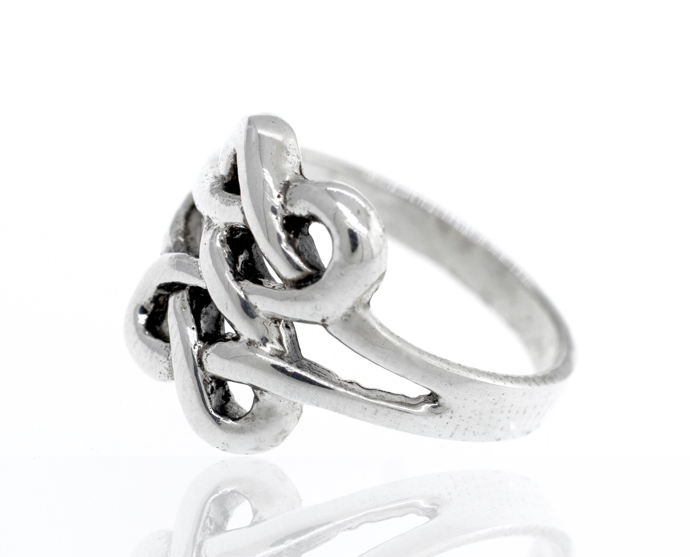 Sterling silver Celtic knot ring becomes Sterling silver Celtic Knot Design Ring.