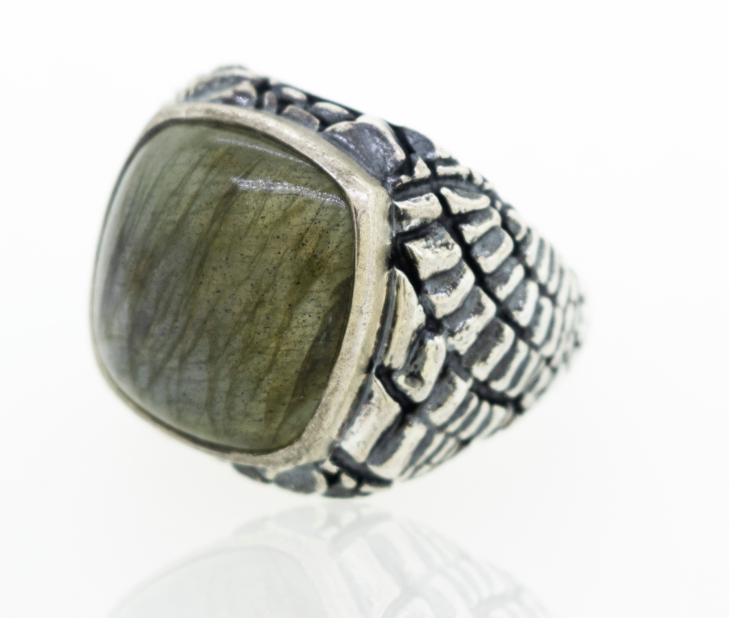 A minimalist silver Heavy Signet Labradorite Ring with a labradorite stone.